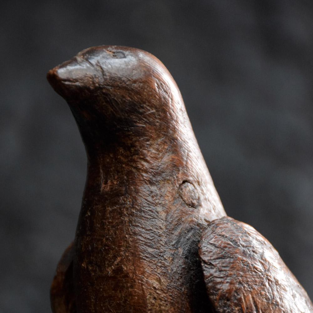 19th century folk art carved bird figure
A 19th century hand carved folk-art figure of a bird constructed of section wood with metal legs. A deep natural patina and worn look across all this delightful decorative item. 
Size in inches: H 6.5” x W