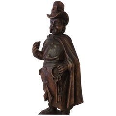 19th Century Folk Art Figure of Man with Keys, Carved from One Piece of Walnut 19th Century Folk Art Figure of Man with Keys, Carved from One Piece of Walnut
