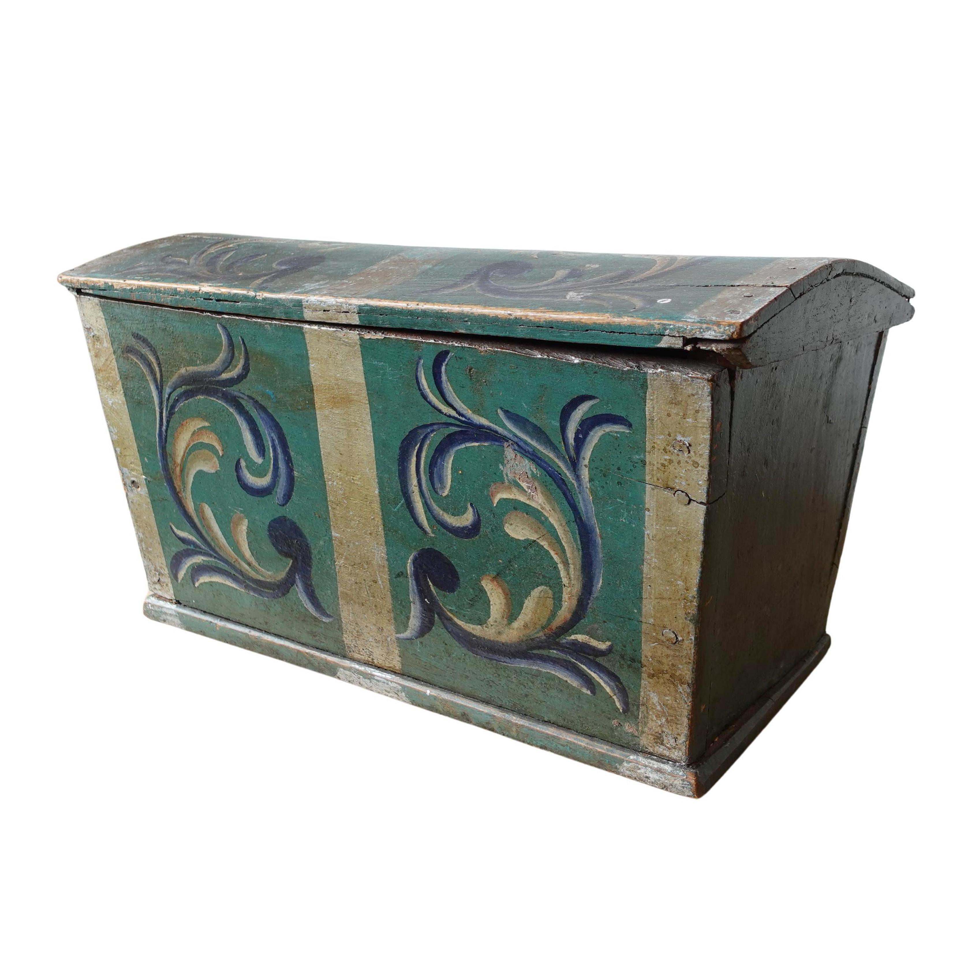Anonymous
Probably Sweden; early 19th century
Polychrome wood (probably pine); iron

Approximate size: 11 (h) x 18.5 (w) x 10 (d) in.

A handsome dome lidded Scandinavian immigrants’ box with a lovely painted green and blue tonal palette with