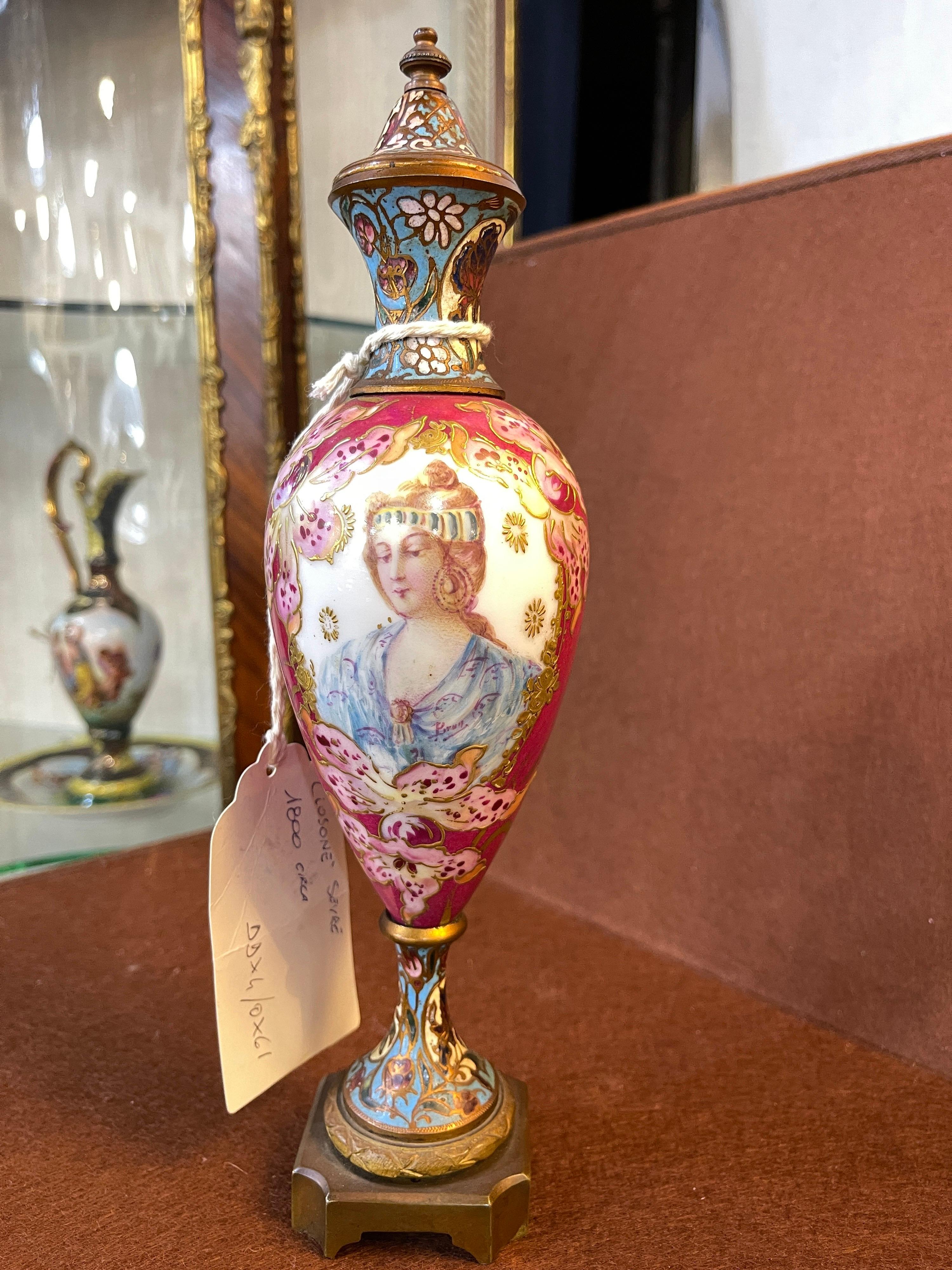 Fantastic Porcelain and Cloisonné bronze vases, France, 1880 circa ,Louis XVI revival. Beautiful painting on the front of a maiden, on the rest of the surface painted with floral motifs. Signed at lower right on the portrait of the maiden.
Cloisonnè