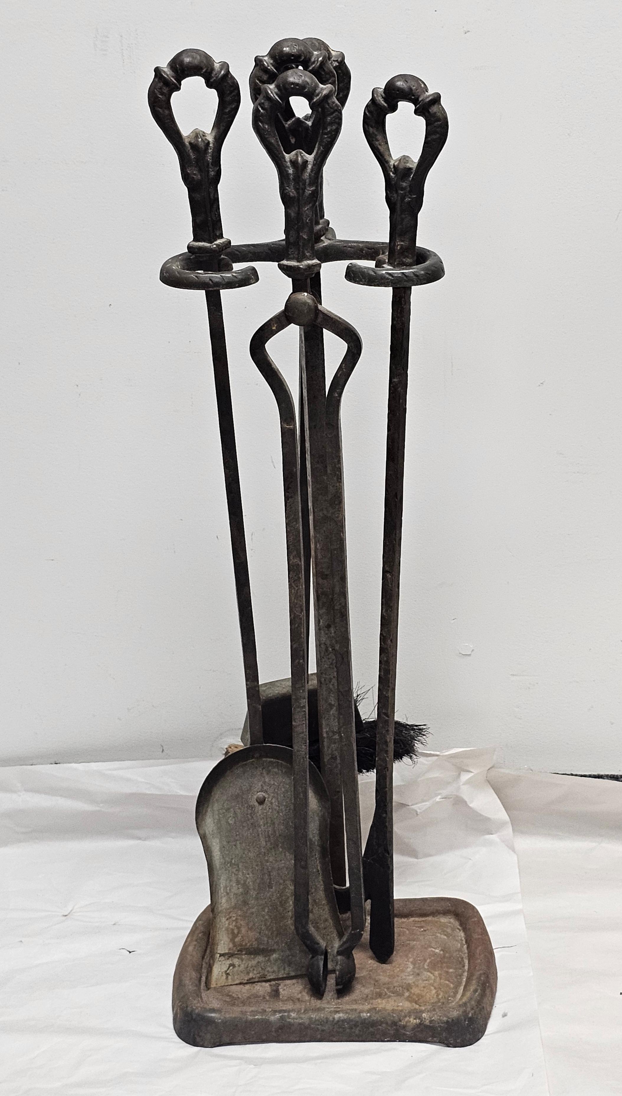 A 19th Century Forged and Hammered  Iron Fireplace Tools Set with Stand. 4 Tools with stand.
 Measures 10