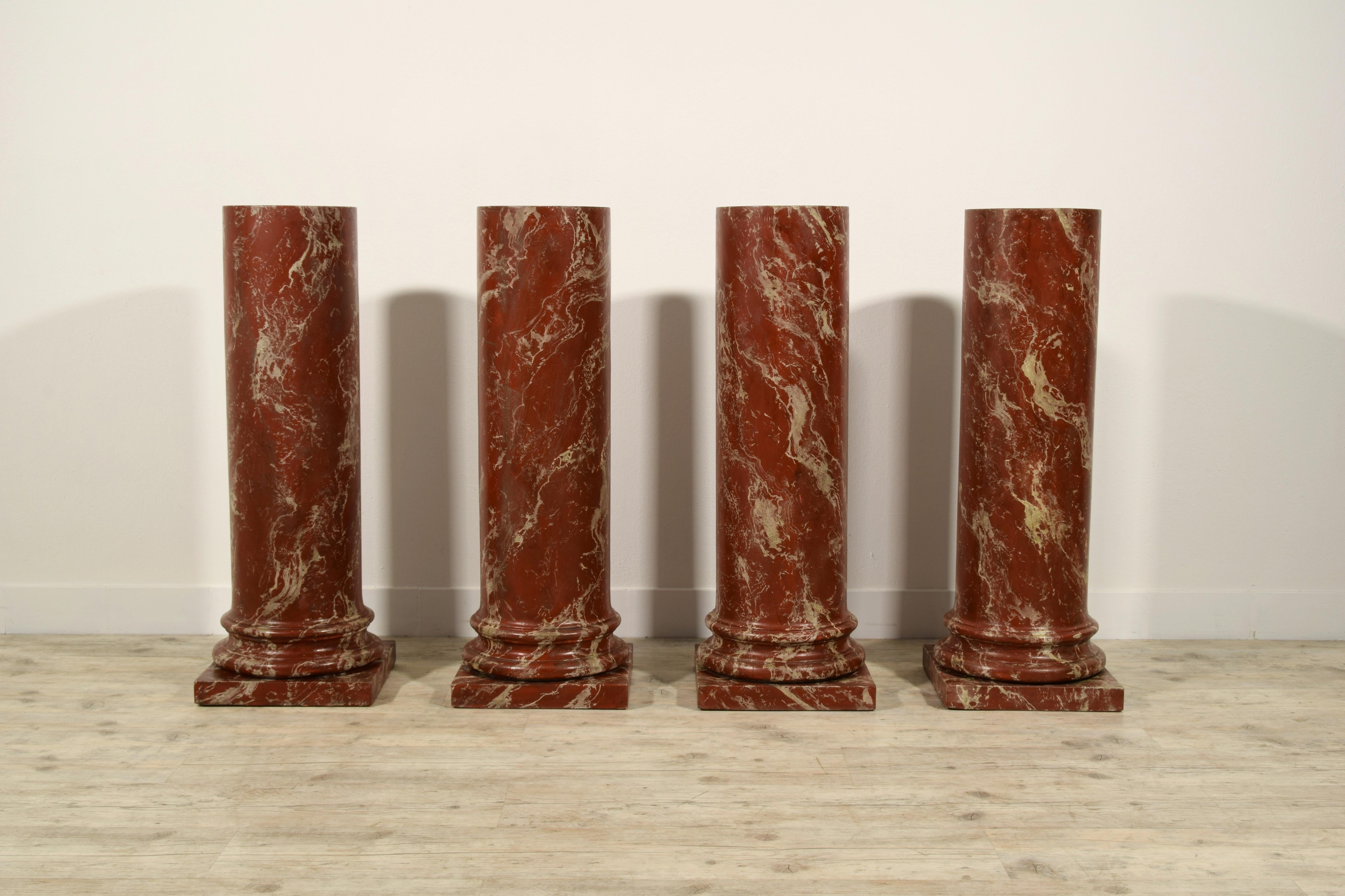 19th century, four Italian wood columns lacquered in Faux Rosso di Verona marble

Measurements: cm H 101,5 x base 36 x 36 - base diameter 27 cm
The four columns were in the early nineteenth century carved wood. They are composed of the stem of a
