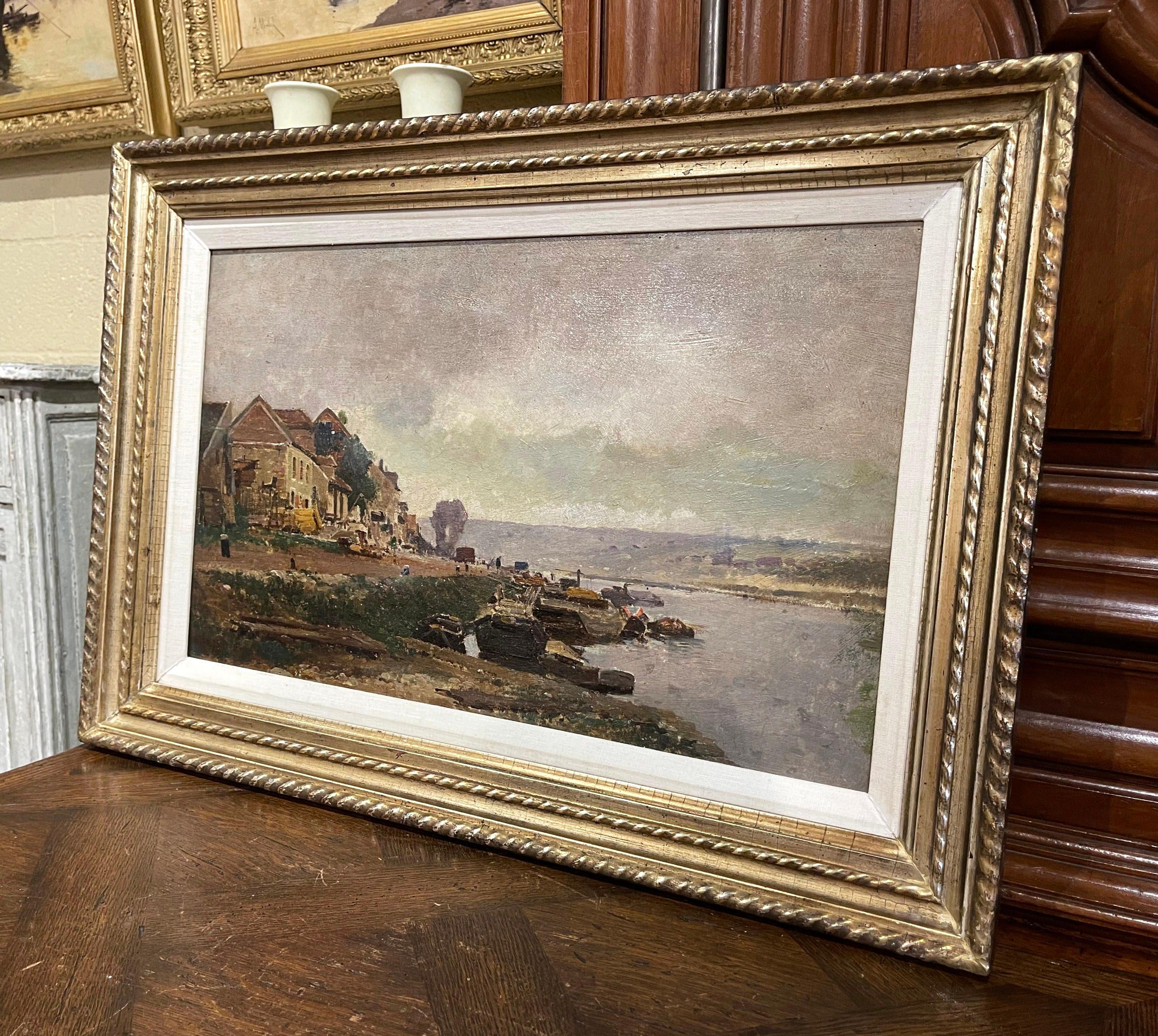 Decorate a study, living room or den with this beautiful and colorful antique painting! Painted in France circa 1890, the artwork on board is set in a carved gilt wood frame and illustrates a picturesque, countryside scene in rural France with a