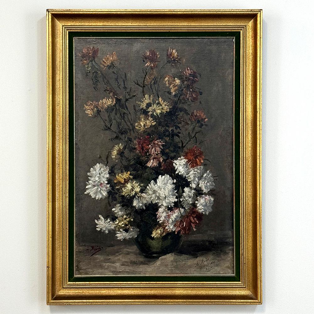 19th Century Framed Oil Painting on Canvas by A. Marie dated 1889 is an unusual still life, glorifying the natural beauty of wildflowers as opposed to a meticulously arranged bouquet.  The study also shows the life cycle of the fresh-cut flowers,