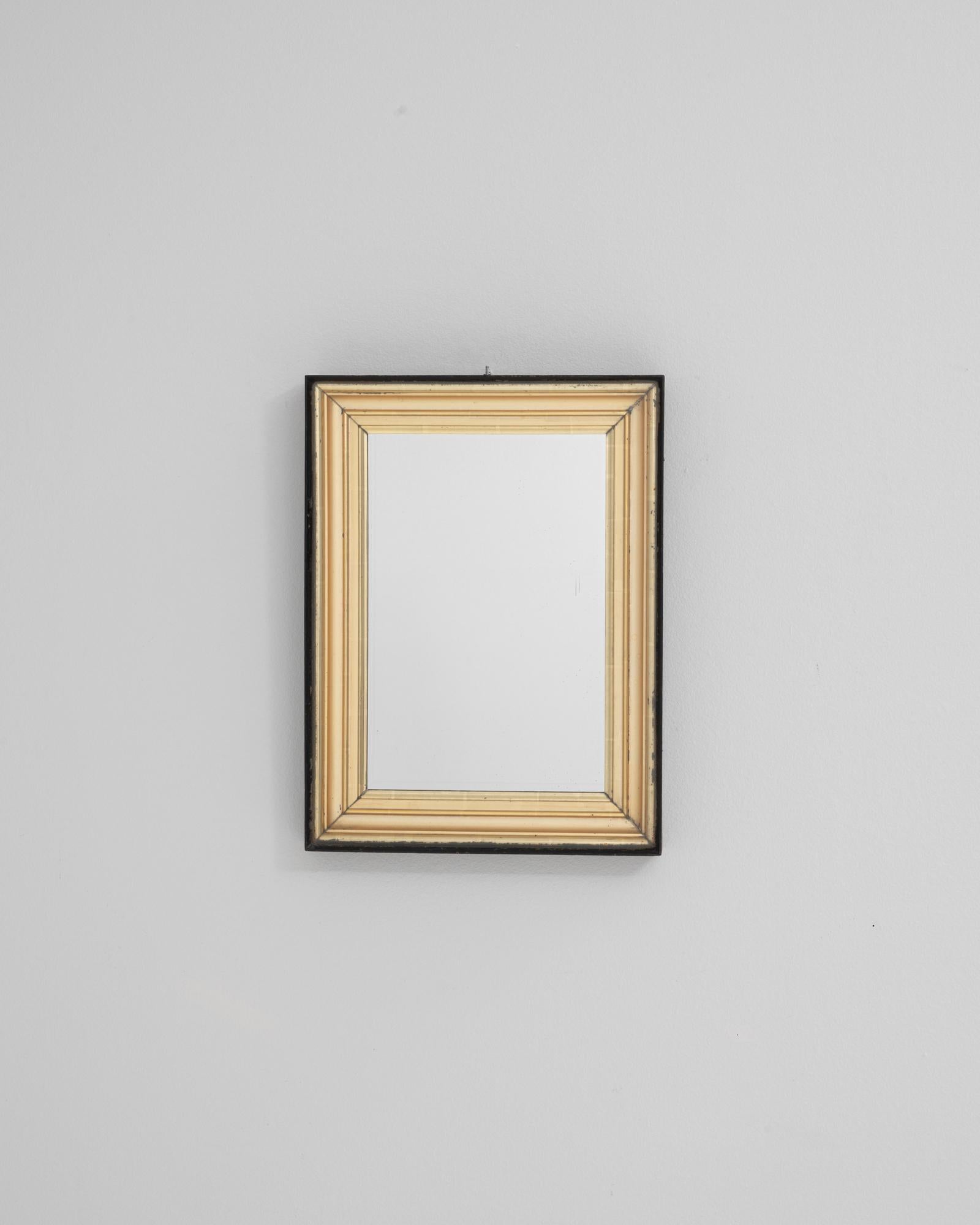 Français Miroir en bois patiné, noir et doré, France 19ème siècle en vente