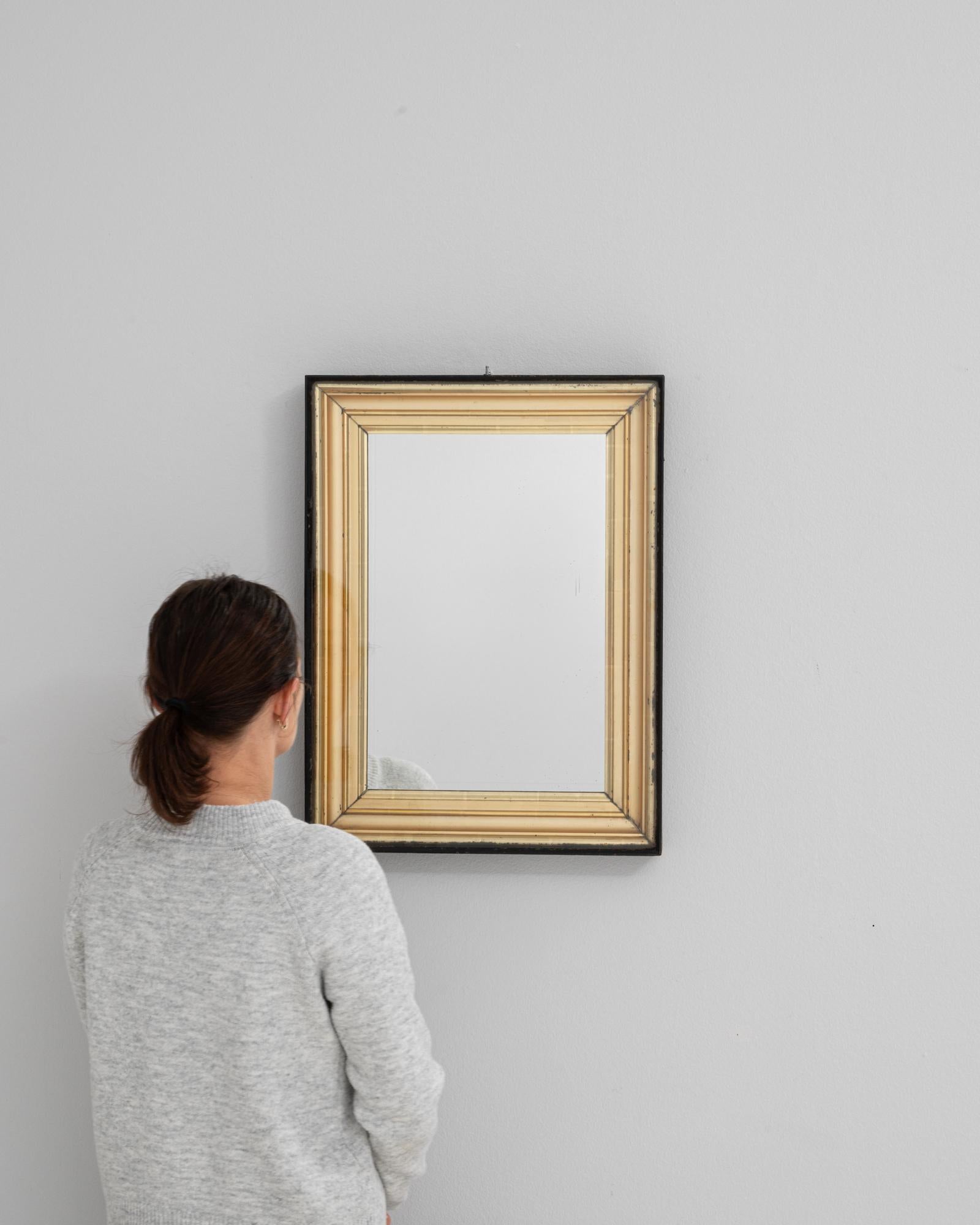 Patiné Miroir en bois patiné, noir et doré, France 19ème siècle en vente