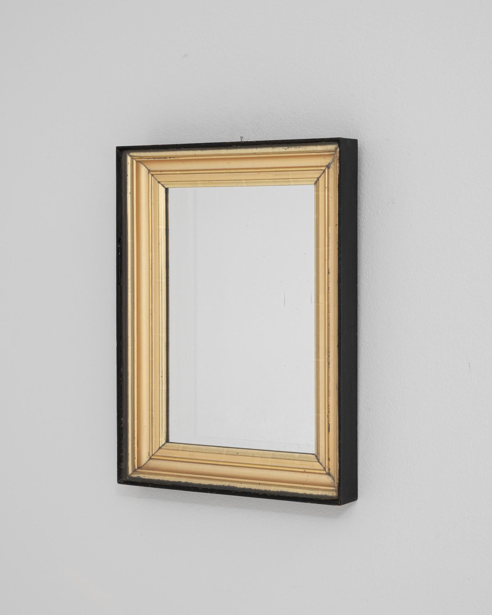 Bois Miroir en bois patiné, noir et doré, France 19ème siècle en vente