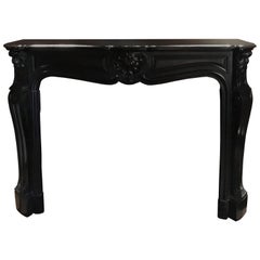 France Mid-19th Century Baroque Black Marble Fireplace