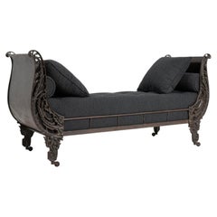 19th Century France Deep Ebony Black Carved Daybed With Upholstered Bolsters