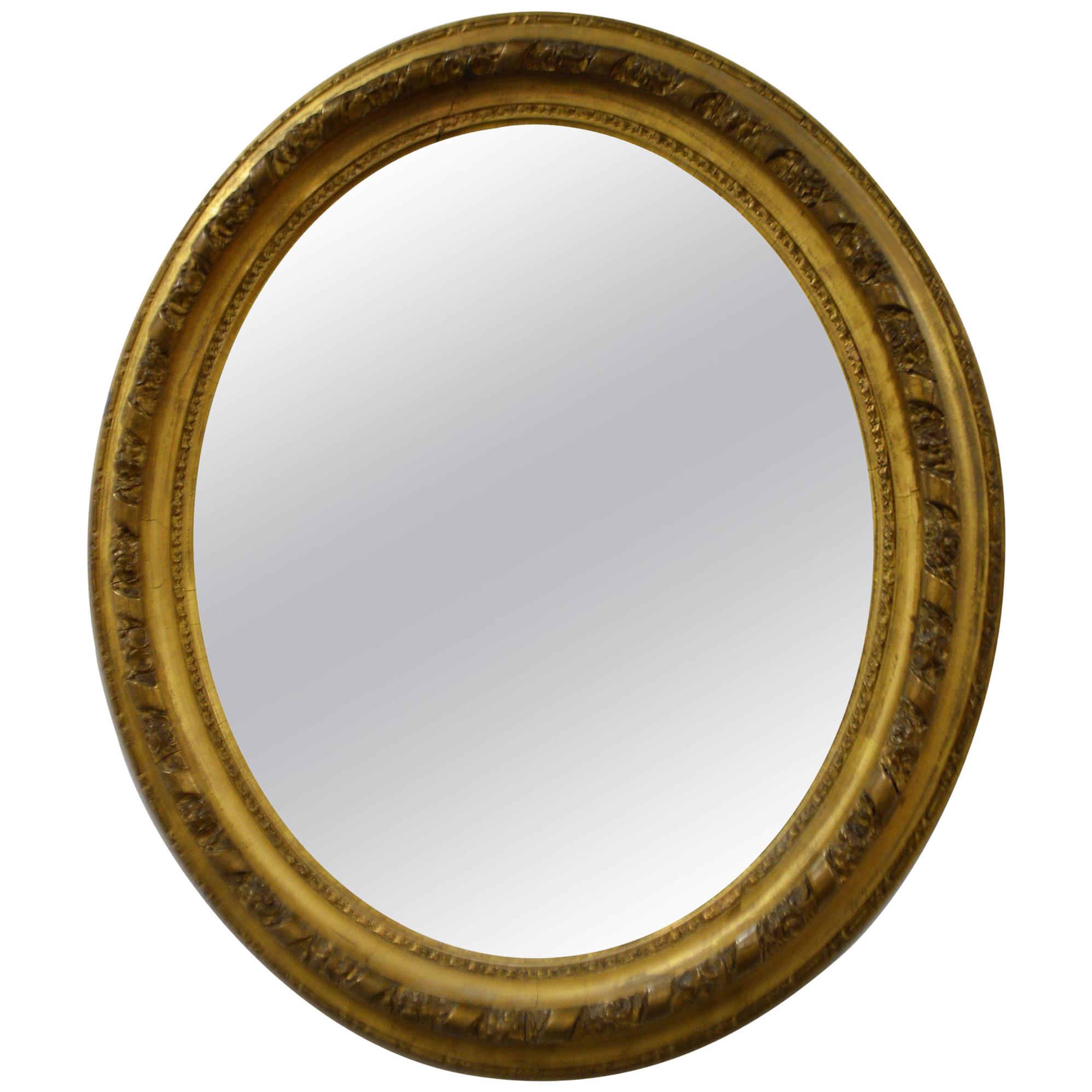 19th Century France Gilded Louis XV Style Oval Mirror For Sale