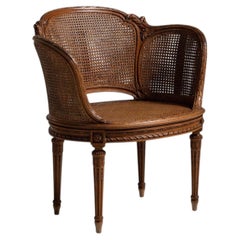 19th Century France Rich Walnut Brown Caned-Back Walnut Armchair