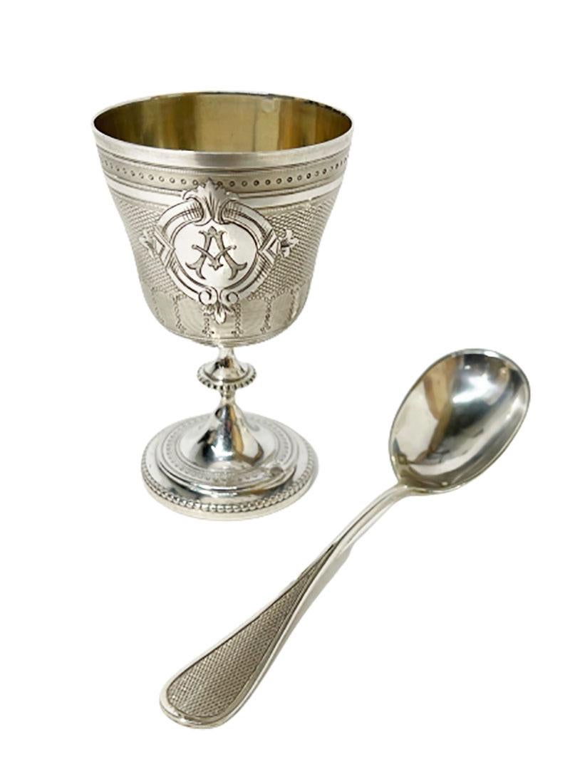 19th century France silver boxed egg cup and spoon by Pellerin & Lemoing

A goblet shaped silver egg cup and silver egg spoon 
These are very finely engraved and with a monogrammed letter A in medallion and back of the spoon
The silver set is