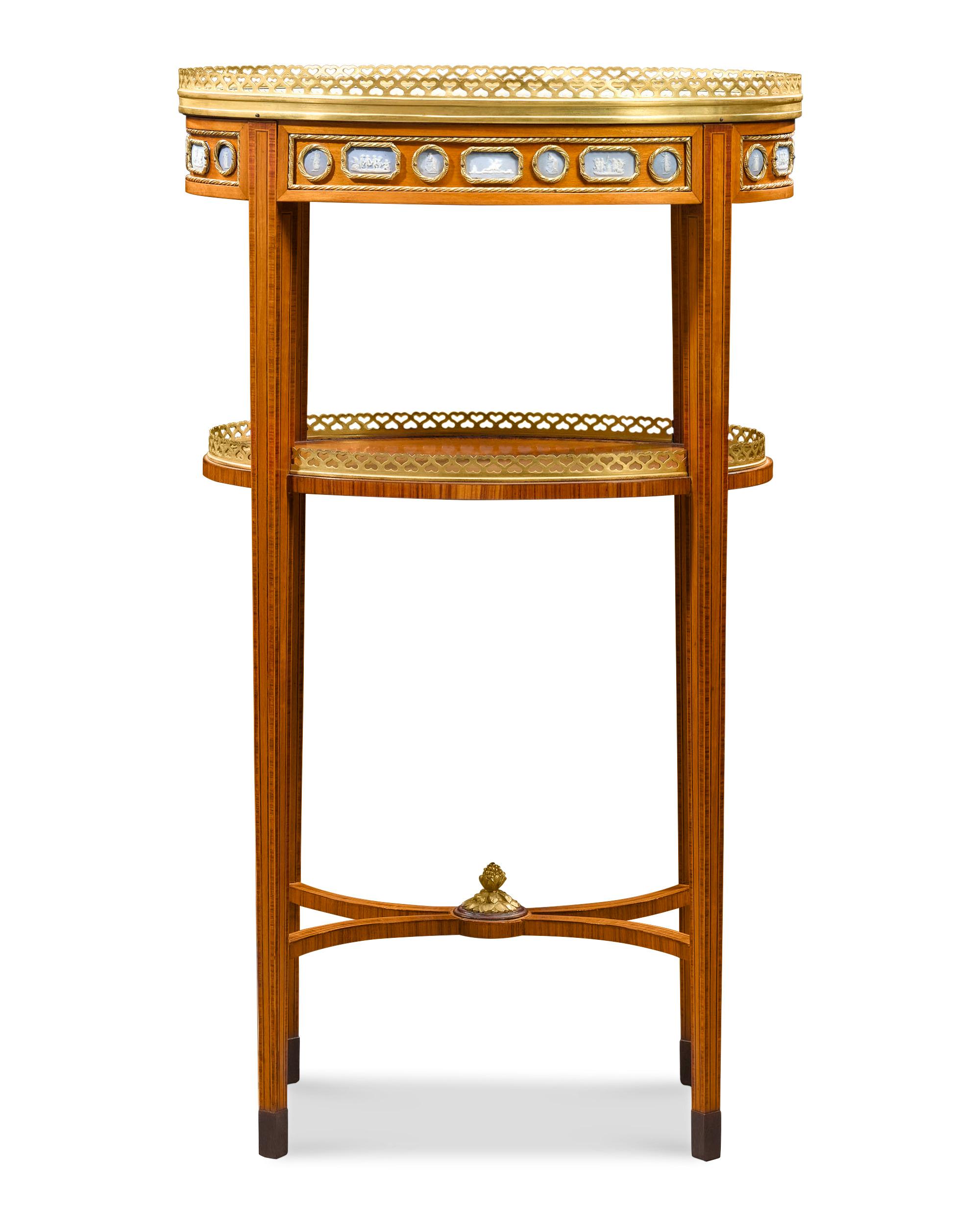 Exquisite craftsmanship in wood is coupled with the elegance of Wedgwood in this remarkable side table. Highly similar to one of French cabinetmaker Francois Linke's most enquired-after designs at the 1904 World's Fair in St. Louis, this outstanding
