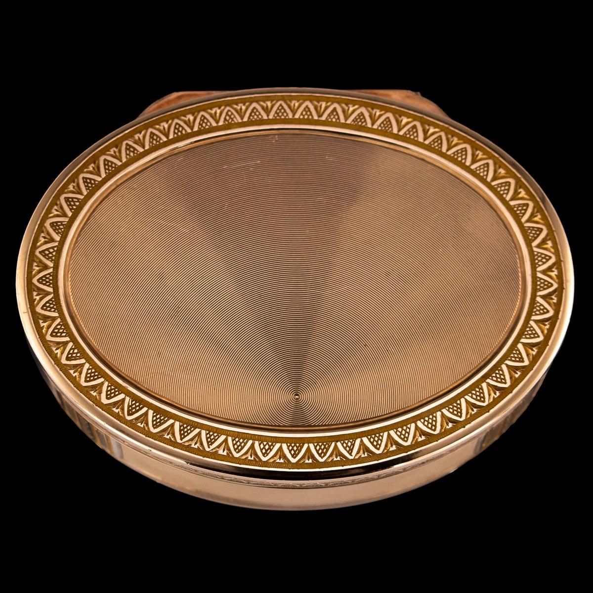 Antique 19th century French magnificent 18-karat gold snuff box, of traditional oval form, engine turned, sides chased with acanthus leaf boarders and engine turned sunburst ground. Hallmarked 18-karat (750 gold standard), Makers mark FO (unknown to