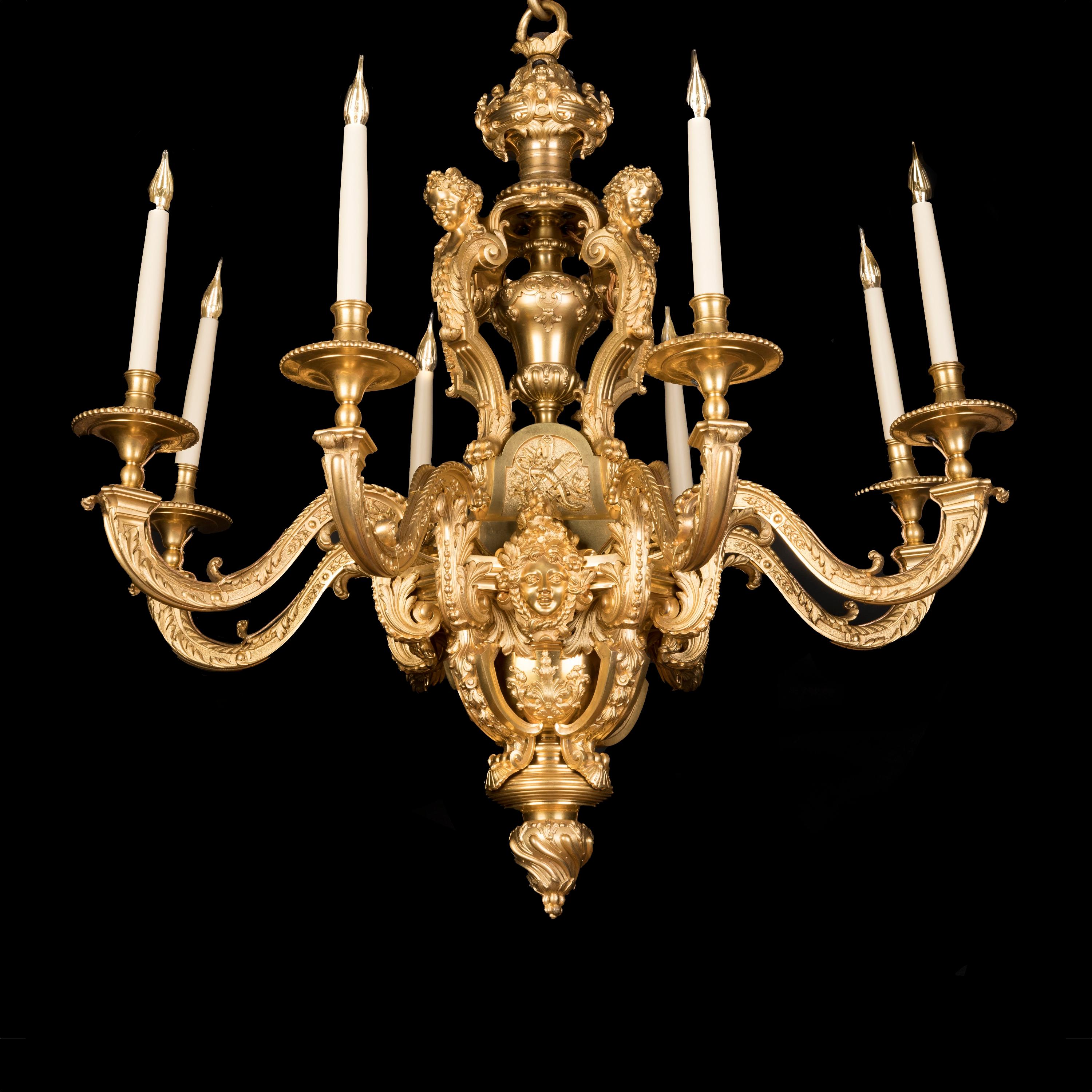An Exceptional French 8-Light Chandelier
By Lacarrière frères & Delatour

In the manner of André-Charles Boulle

Cast from bronze, hand-chased and fire gilded with burnished highlights, the chandelier having eight S-scroll arms with acanthus leaf