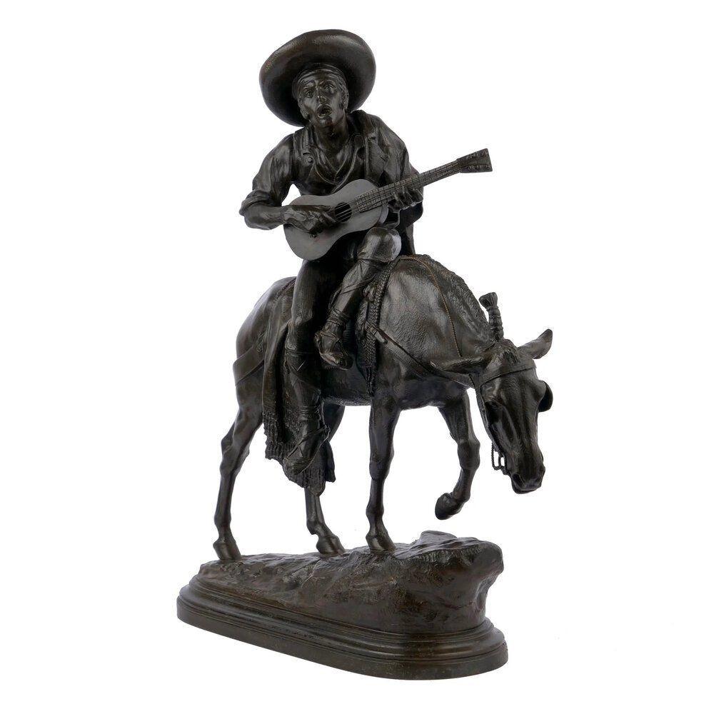 A fine lifetime cast, this bronze sculpture depicts a Spanish peasant playing a classical guitar while riding on the back of a mule. It is a rich model, complete with a handsomely detailed woven blanket saddle, twisted wire reins, finely cast