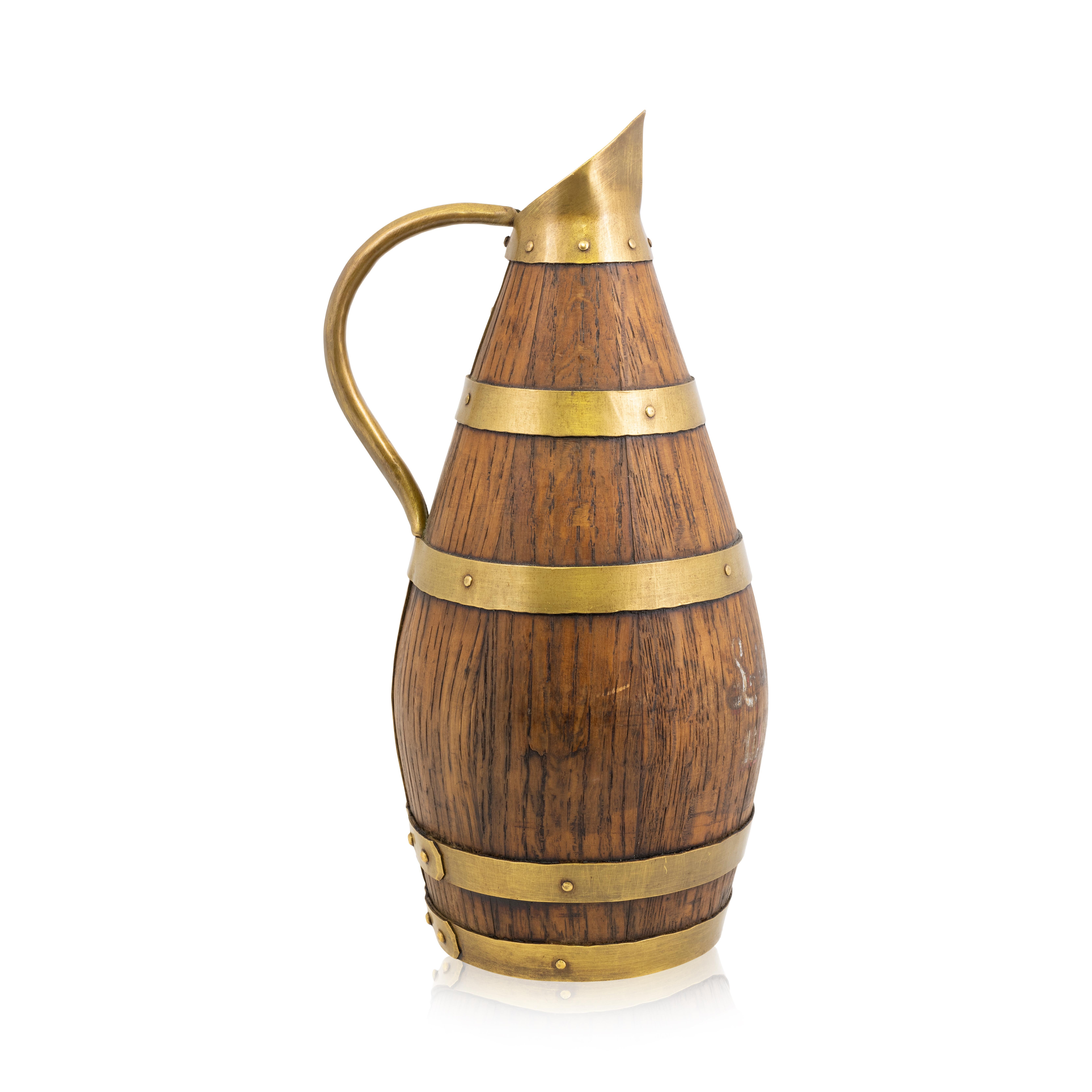 19th Century French alascian wine pitcher of oak with brass banding. A great barware piece!

Period: Last quarter of the 19th century
Origin: France
Size: 11 1/2