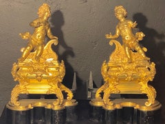 19th Century French Andirons, Opposing Cherubs on Stands in Doré Bronze