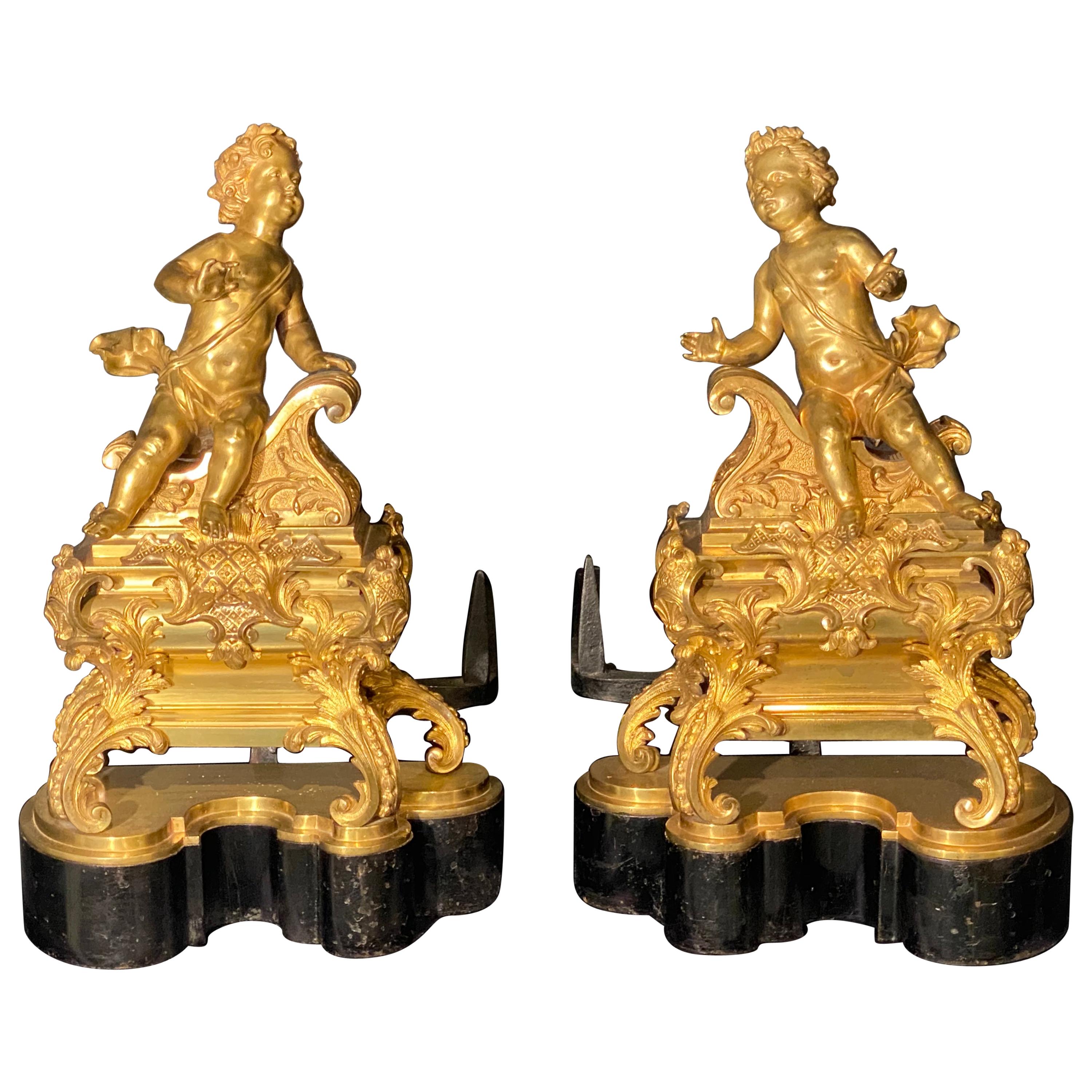 19th Century French Andirons, Opposing Cherubs on Stands in Doré Bronze
