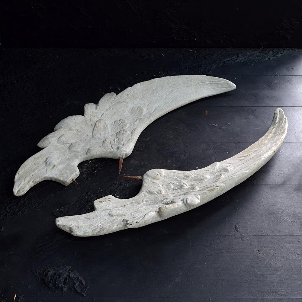 19th Century French Angels wings 

We share what we love, and we love these highly decorative matched pair of oversized statue angel wings. Made from a firm hollow composite/gesso material. Both wings still have their iron pins in place which is