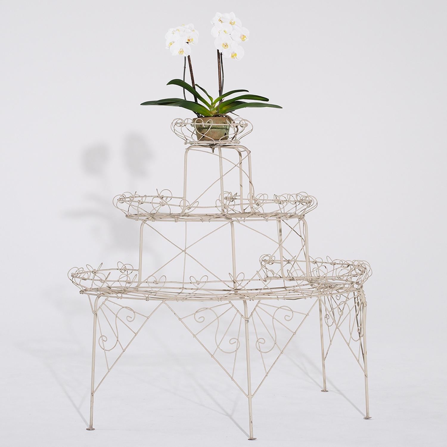 An antique French large three tier design half round garden plant stand, in good condition. This plant holder is made of white wire metal, 2-tier 6