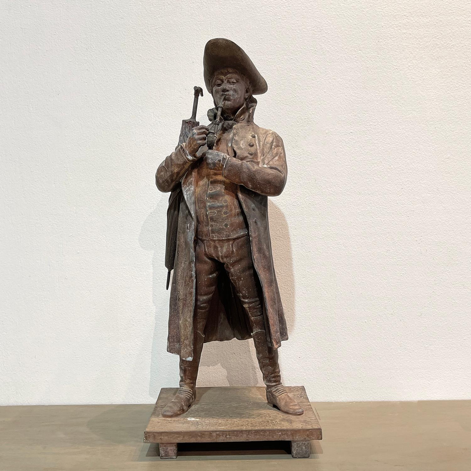 A statuary by L. Hollot French Sculpturor ( 1836 – 1897 ) representing a standing noble man with umbrella, in good condition. Created of Zamak with a very detailed craftsmenship and details. The sculpture is positioned onto a hand carved limestone