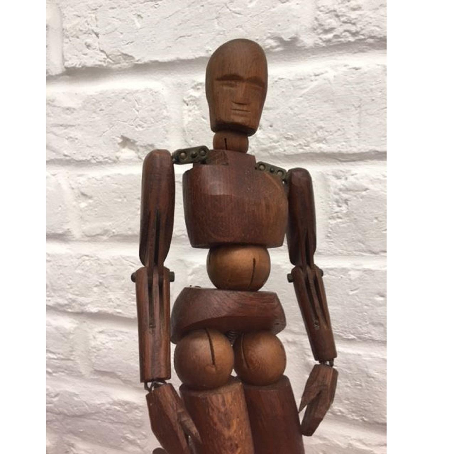19th century French Articulated Wooden Artists Lay Figure, Mannequin on stand
 
Stunning wooden articulated lay figure from the 19th century in original condition. This item features metal pins, bolts and sprung joints. The figure is attached to a
