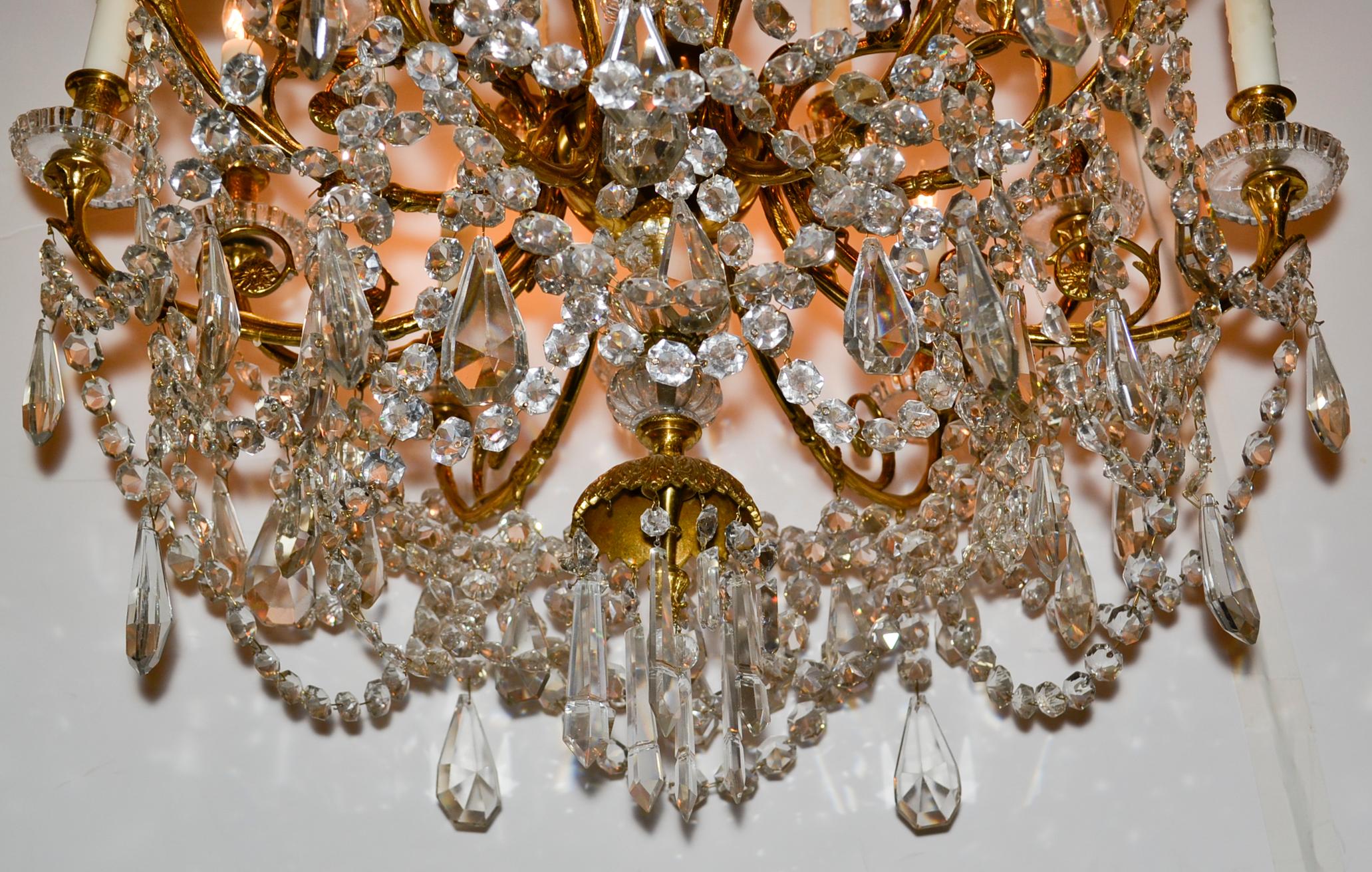 Beautiful 19th century French bronze and crystal 18-light Baccarat chandelier.