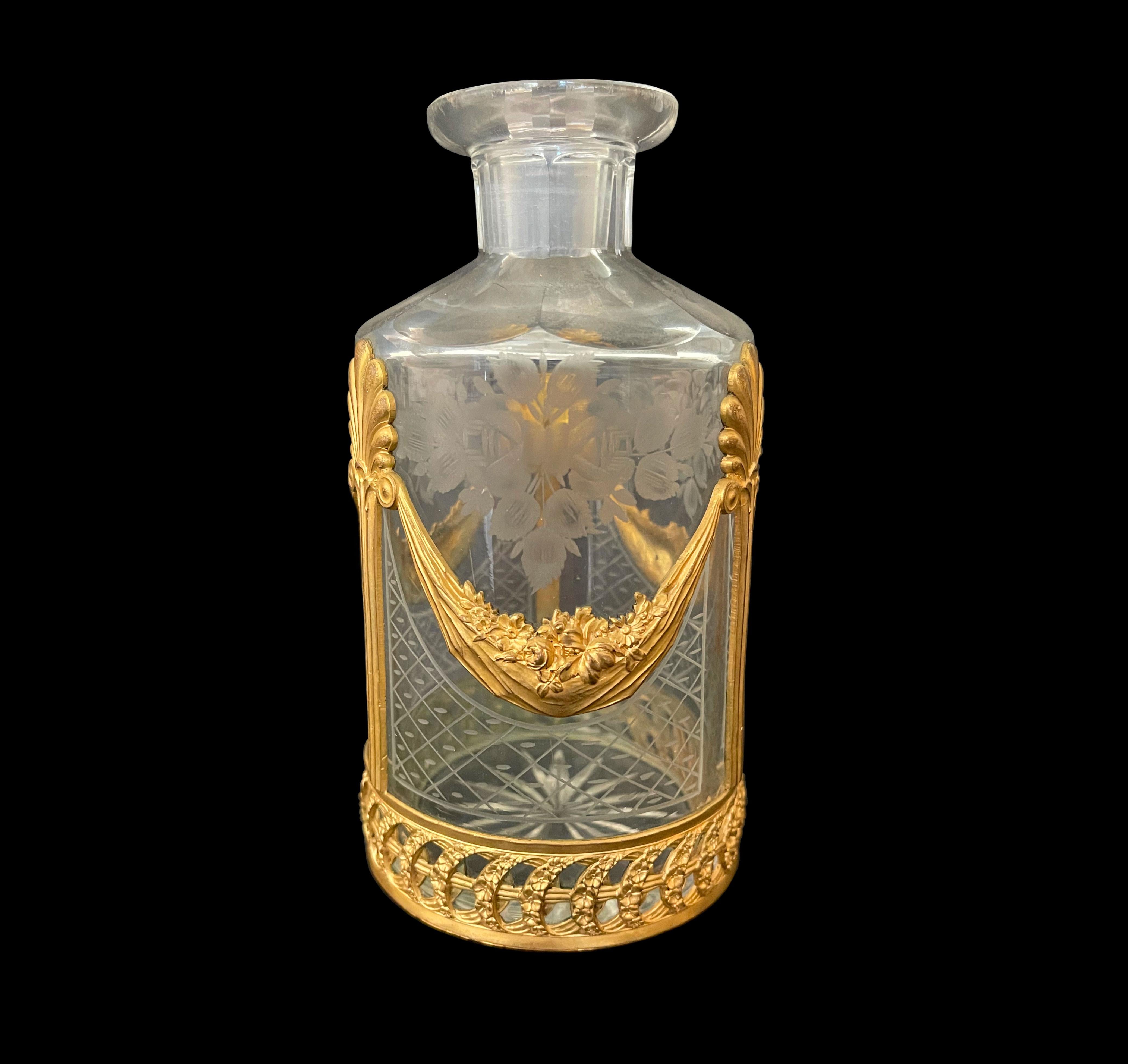 A fine quality 19th C. French Baccarat engraved crystal mounted bronze perfume bottle.

H: 7-1/2”

D: 3”

Baccarat Crystal (pronounced [baka?a]) is a French manufacturer of fine crystal located in Baccarat, France. The company owns two