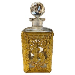 Bouteille en bronze dorée de style Baccarat du 19ème siècle français