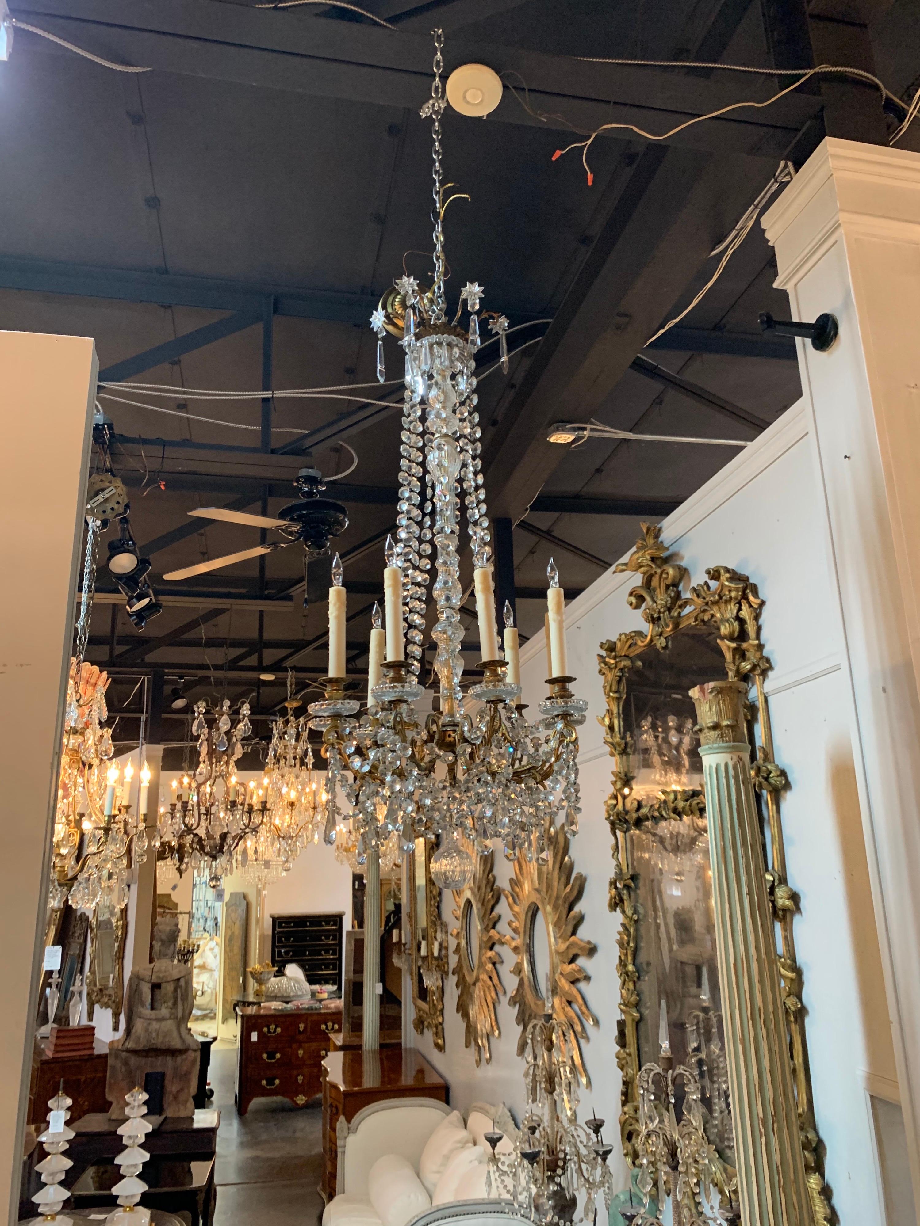 Fabulous 19th century French Baccarrat style gilt bronze and crystal chandelier with 9 lights. Beautiful glistening crystals and an elegant long and narrow shape. Stunning!