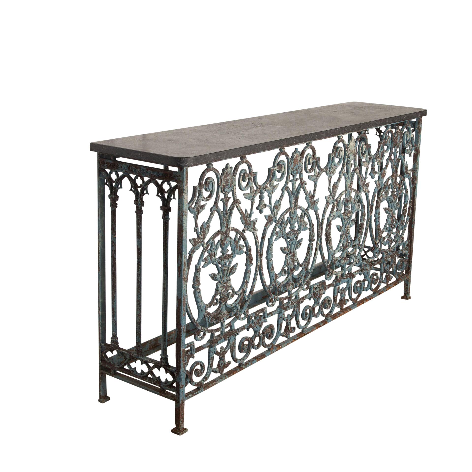 19th Century balcony converted into a console table.
Original superb patina with Belgium blue slate top.
One of a pair currently available.