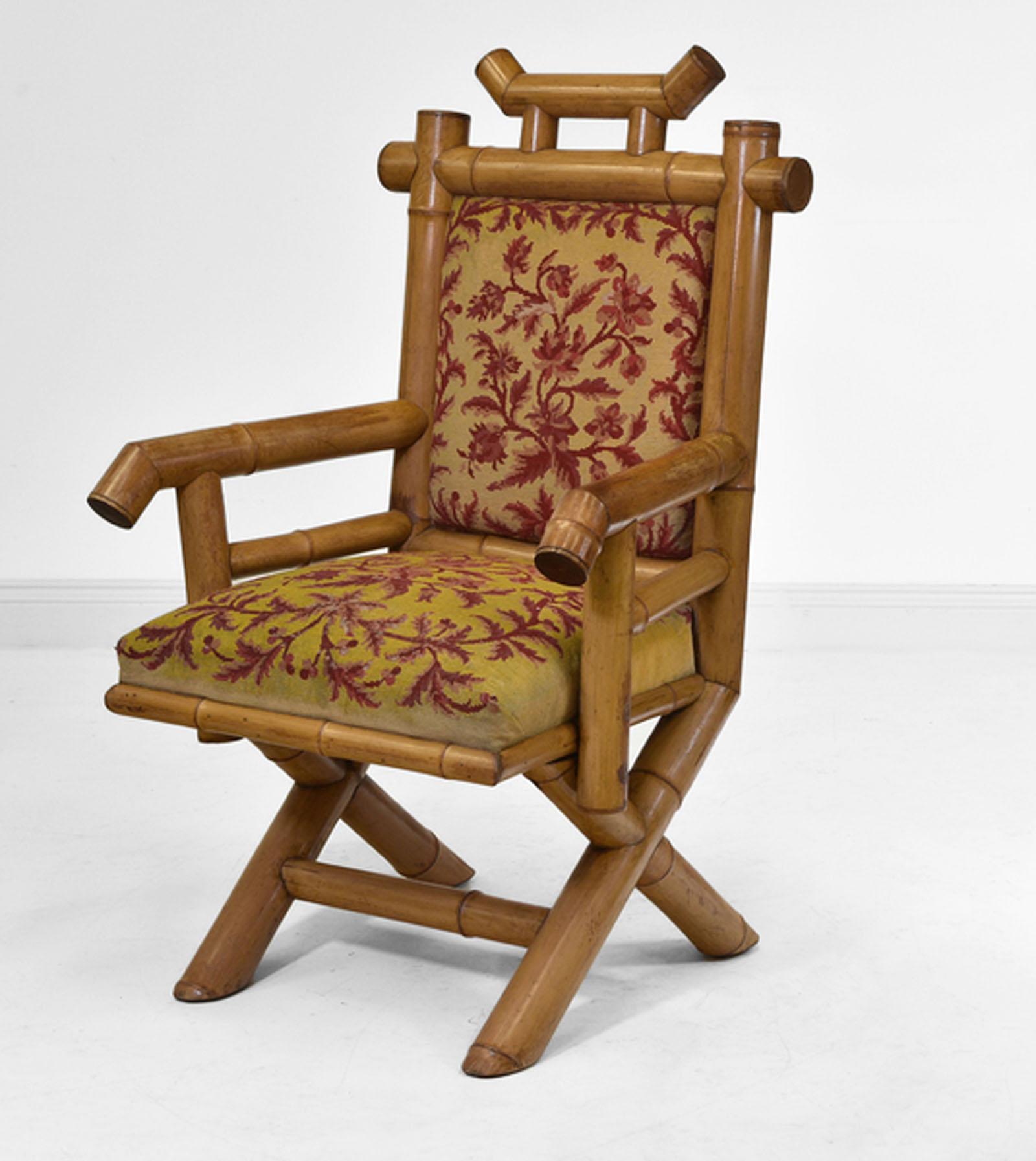Antique French bamboo armchair in the manner of Perret, fils and vibert Paris. Circa 1890.

This interesting armchair is made from large pieces of bamboo, and has the original upholstered fabric to the front. The seating is still very usable,