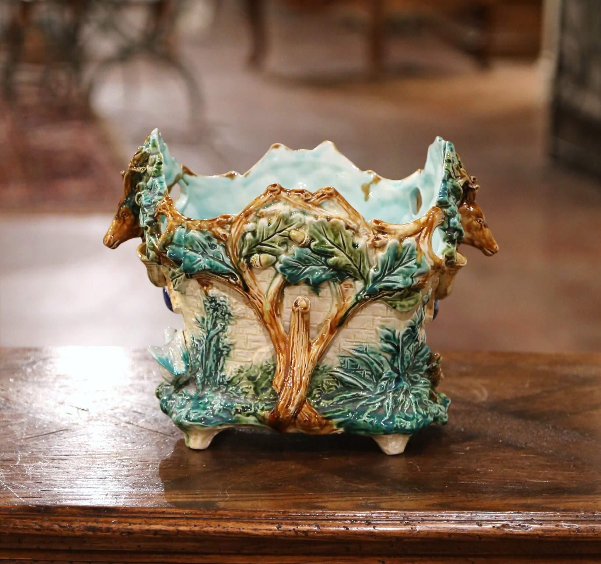 Hand-Carved  19th Century French Hand Painted Faience Barbotine Cachepot with Hunt Motifs