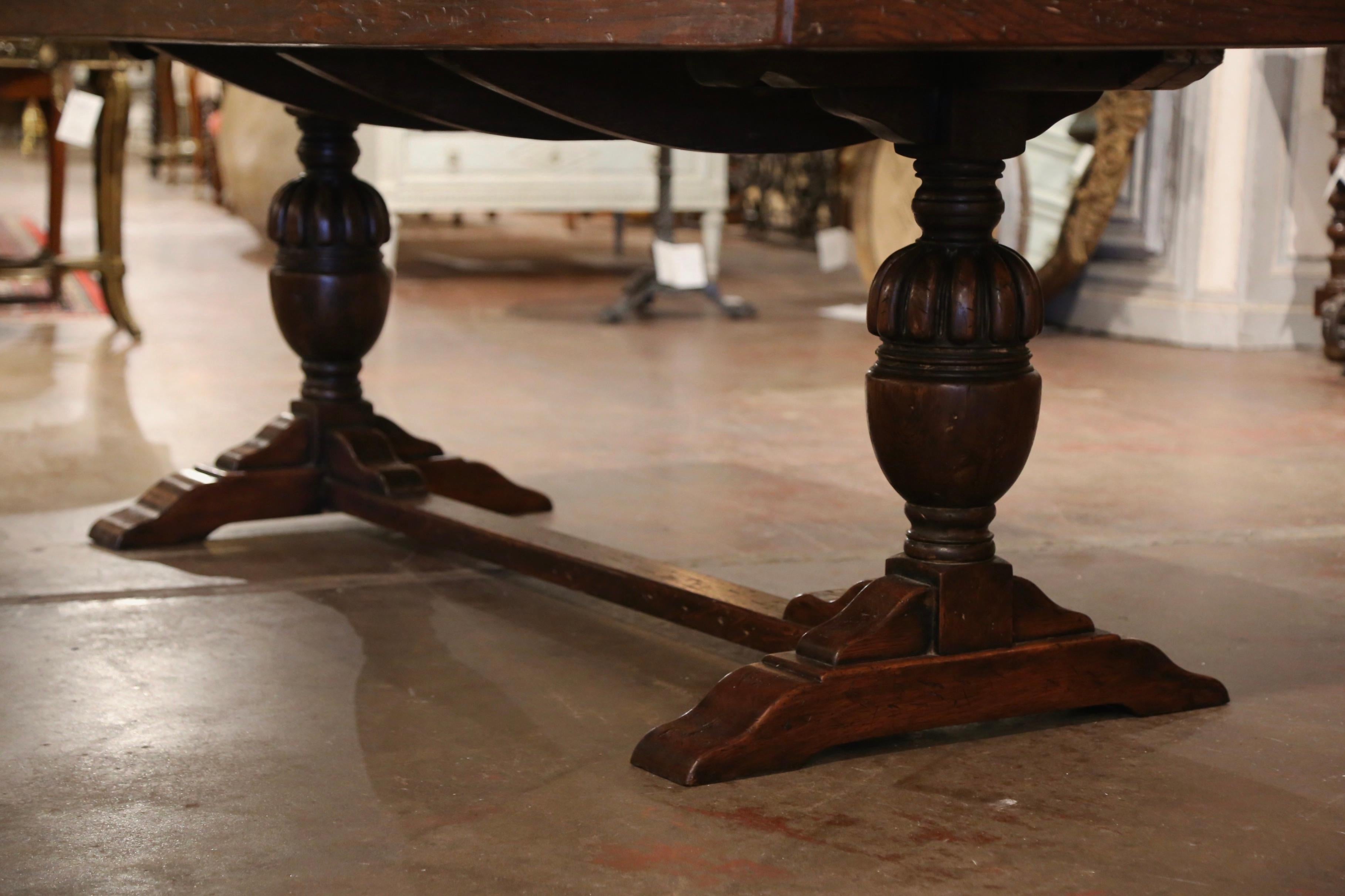 Hand-Carved  19th Century French Baroque Carved Oak Trestle Farm Table with Parquetry Top