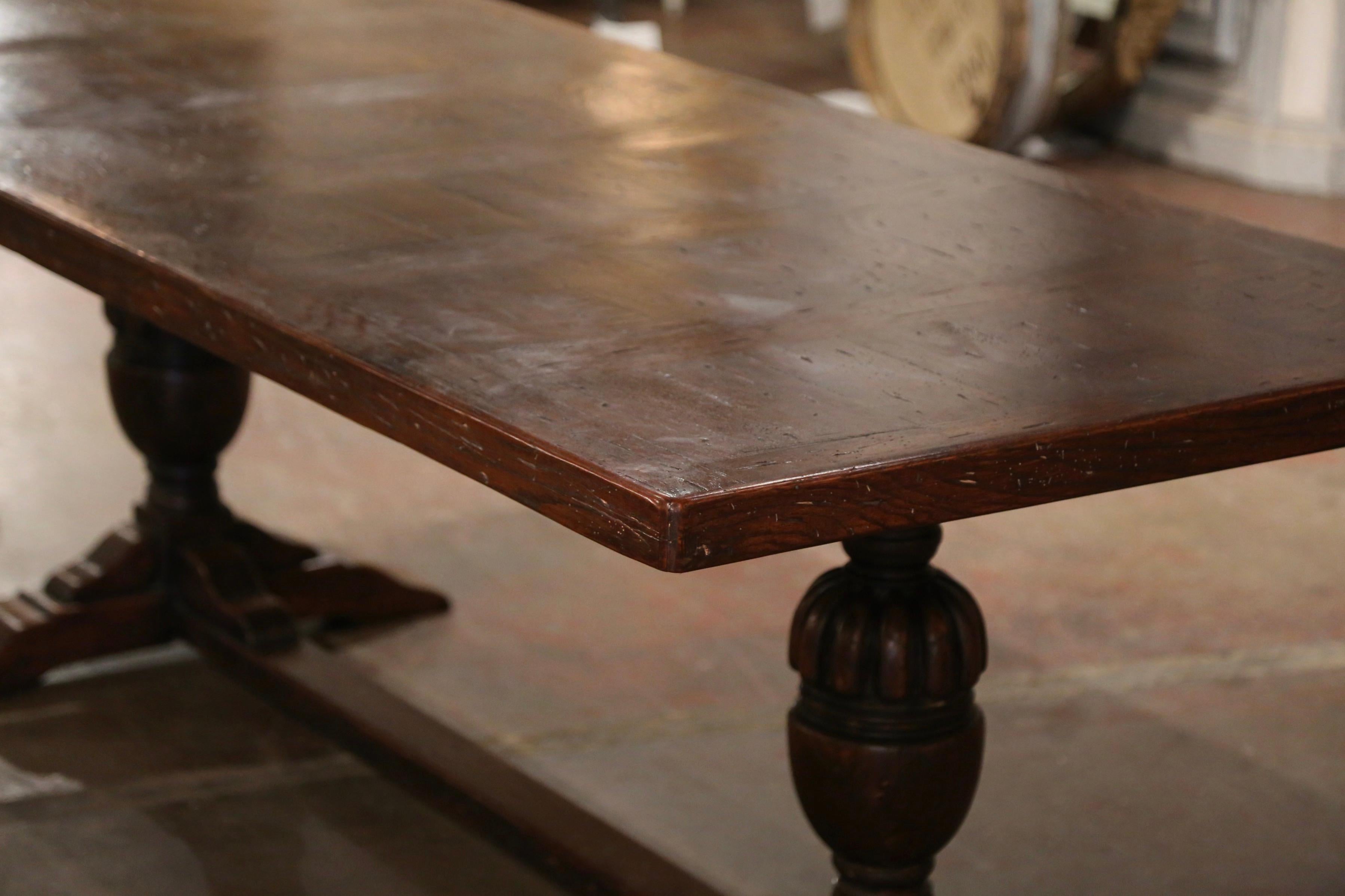  19th Century French Baroque Carved Oak Trestle Farm Table with Parquetry Top In Excellent Condition In Dallas, TX