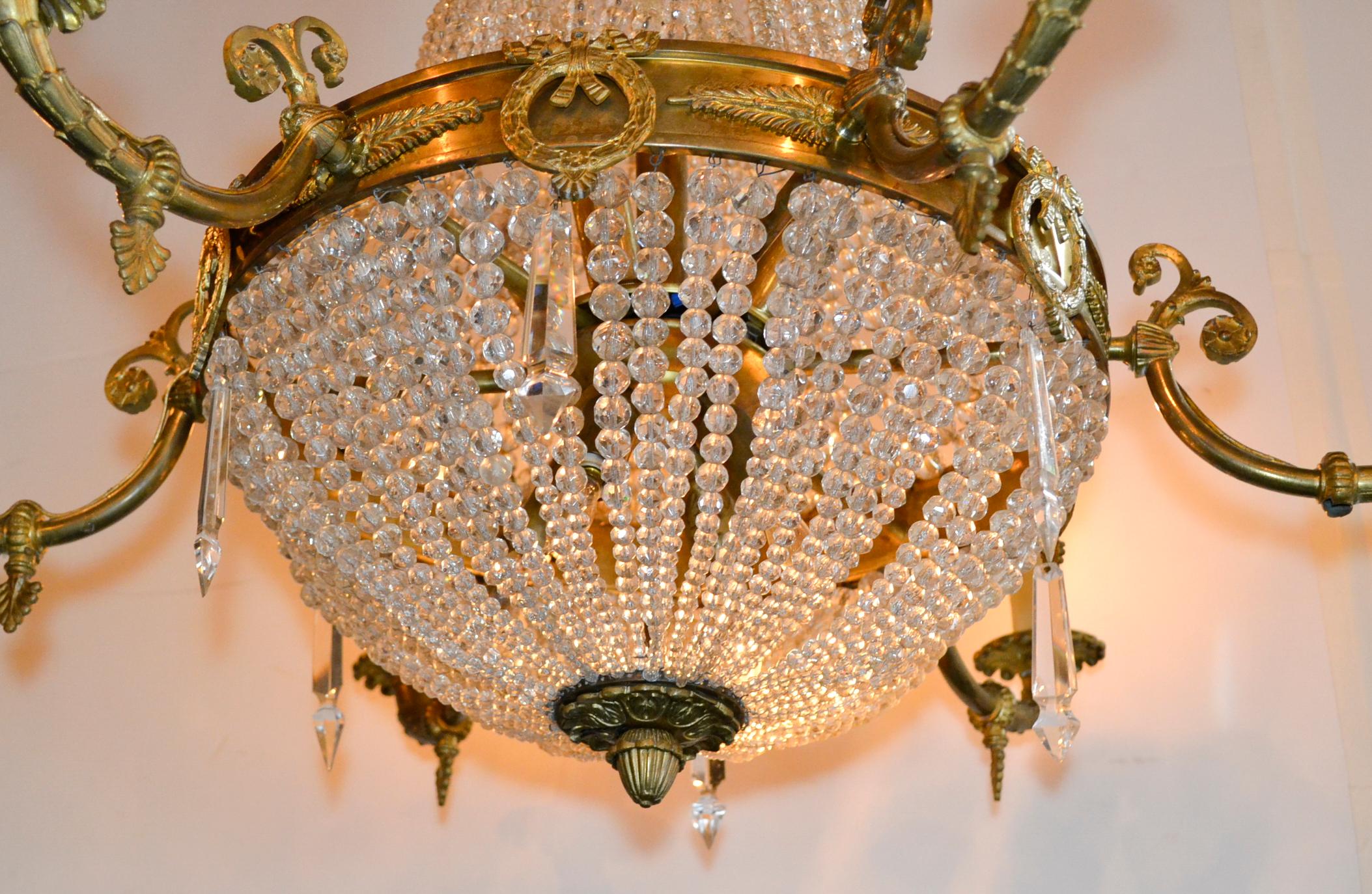Lovely 19th century French gilt bronze 6-light basket chandelier. Beautiful gilt and sparkling crystals make this fixture extra special.  Gorgeous!!
