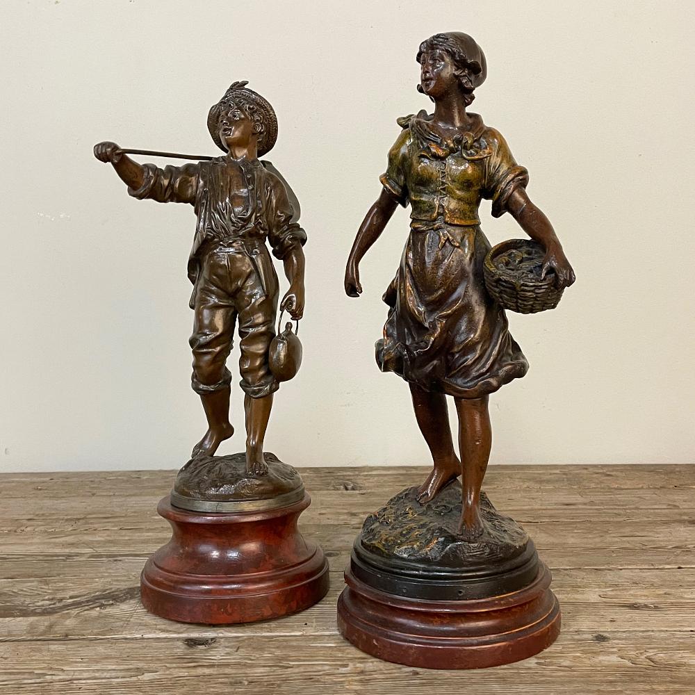 19th century French Belle Epoque statue by Victor Rousseau (1865-1954) displays the artist's talents in emulating the style that glorified rural life during the waning years of the 19th century. Cast in spelter and given a patinaed multi-hued bronze