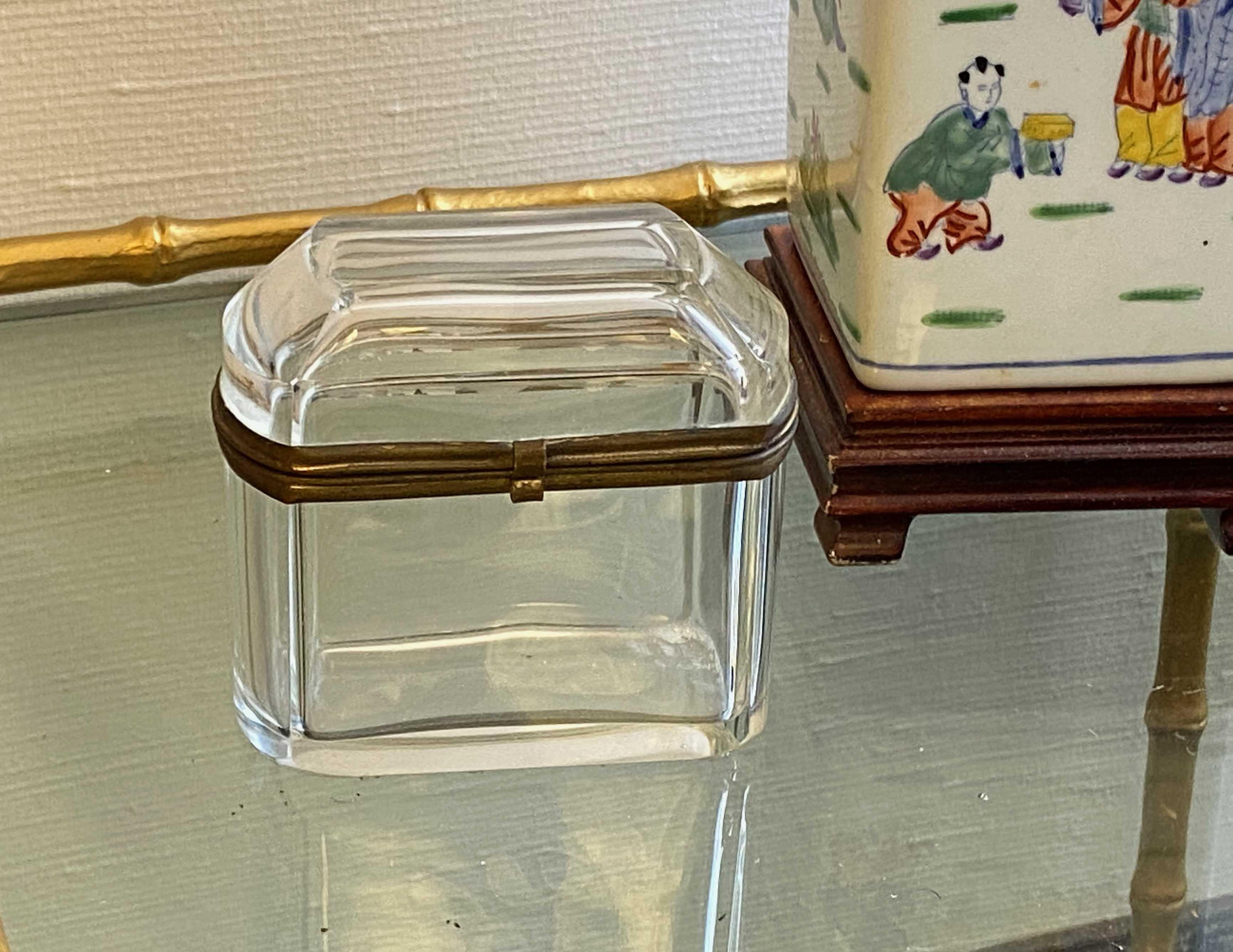 Antique 1800’s French crystal clear beveled glass box with hinged brass closure.Antique 1800’s French crystal clear beveled glass box with hinged brass closure.