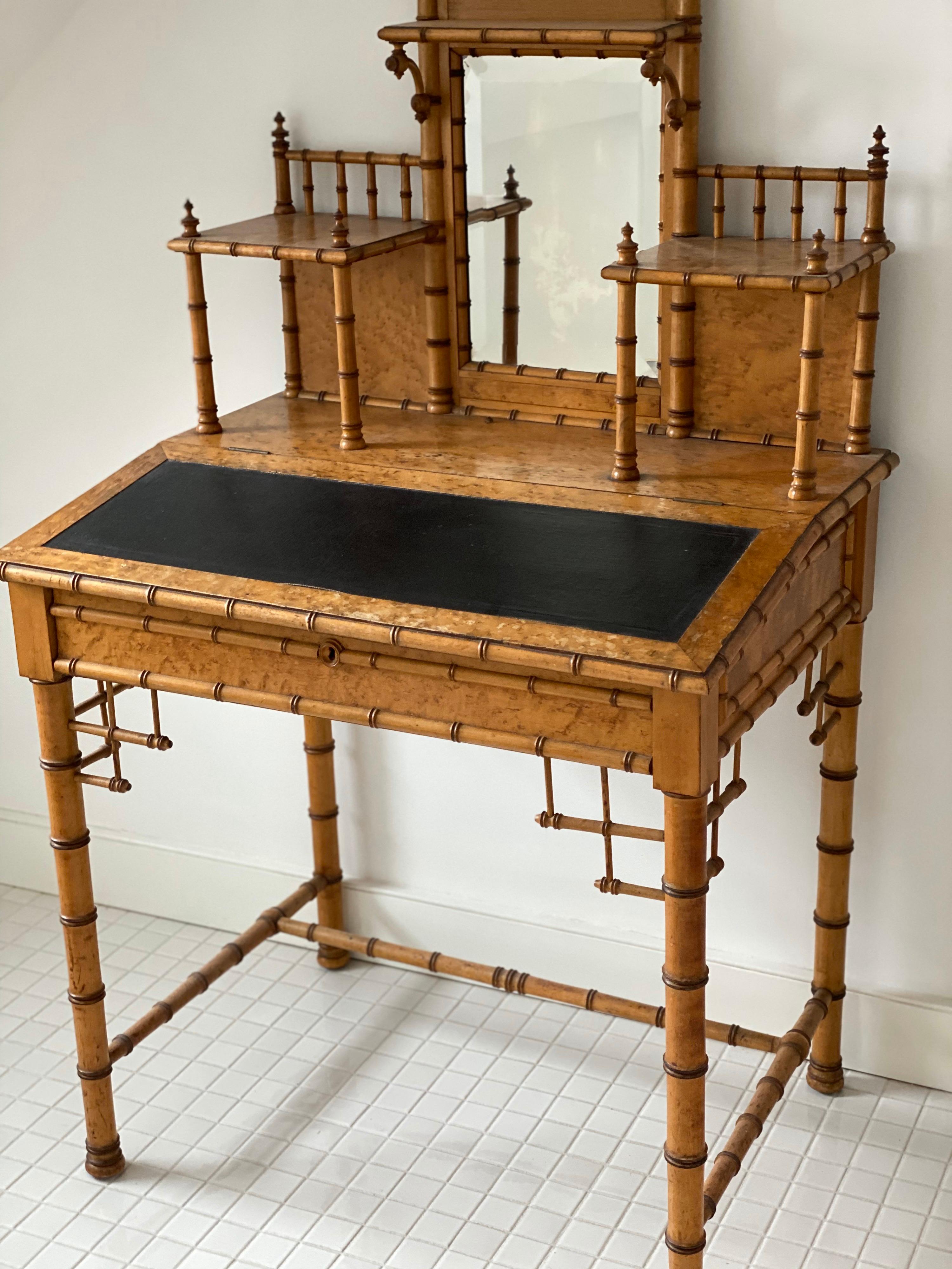 19th century French bird's-eye maple faux bamboo ladies writing desk.
Beautifully delicate bamboo details.
Structurally very good condition. Water marks to finish on top.
Dimensions:
31
