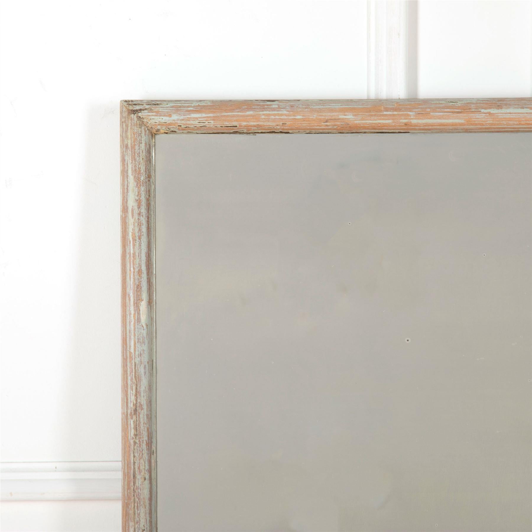 French dry scraped bistro mirror retaining the original mercury glass.