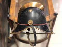 Französisches schwarzes Messing-Feuerwehrhelm mit Löwenköpfen aus dem 19. Jahrhundert