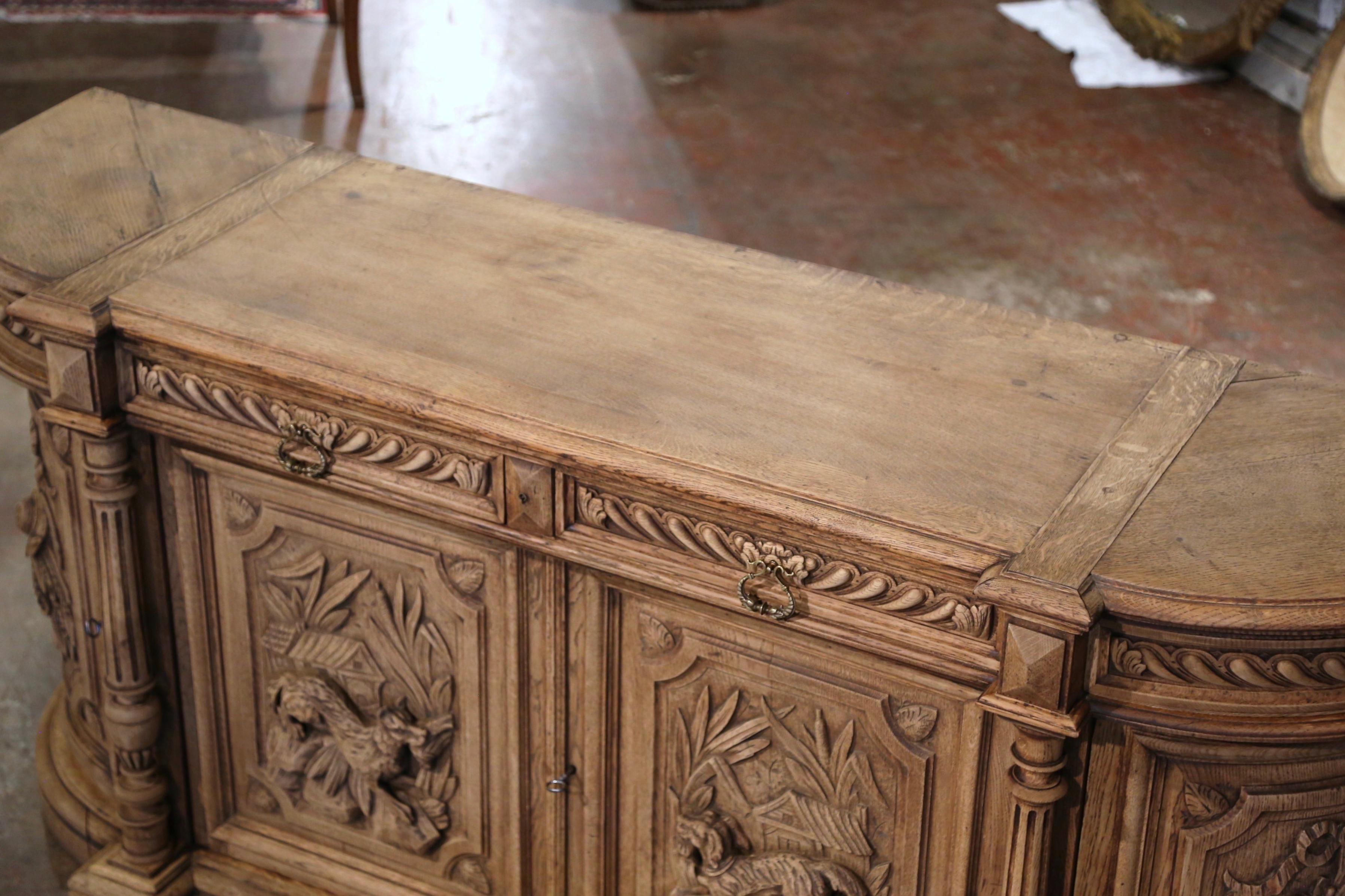 Hand-Carved 19th Century French Black Forest Carved Bleached Oak Four-Door Buffet Enfilade For Sale