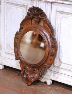 19th Century French Black Forest Carved Oak Mirror with Floral Crest