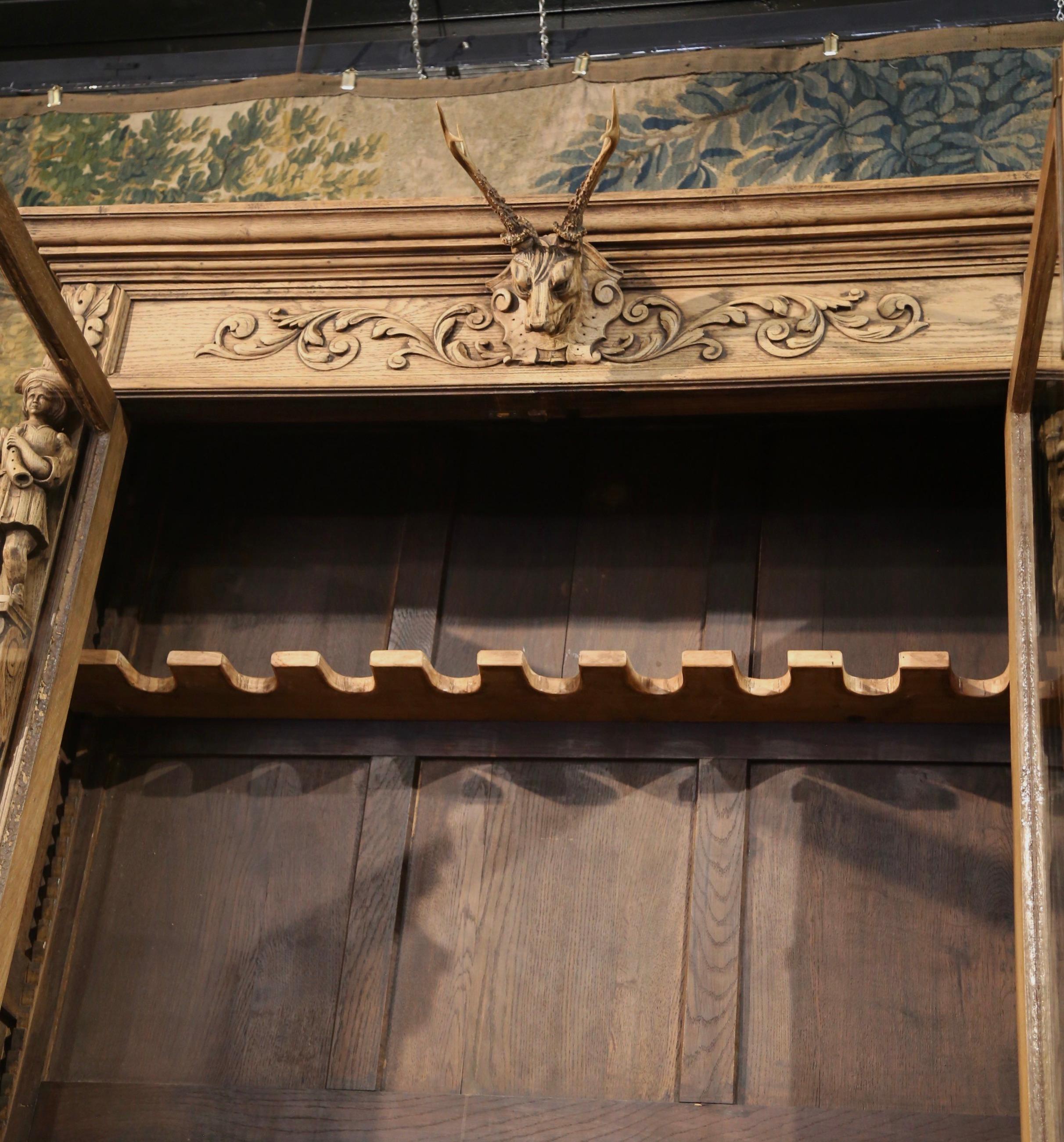 19th Century French Black Forest Carved Oak Nine-Gun Cabinet with Hunt Motifs 9