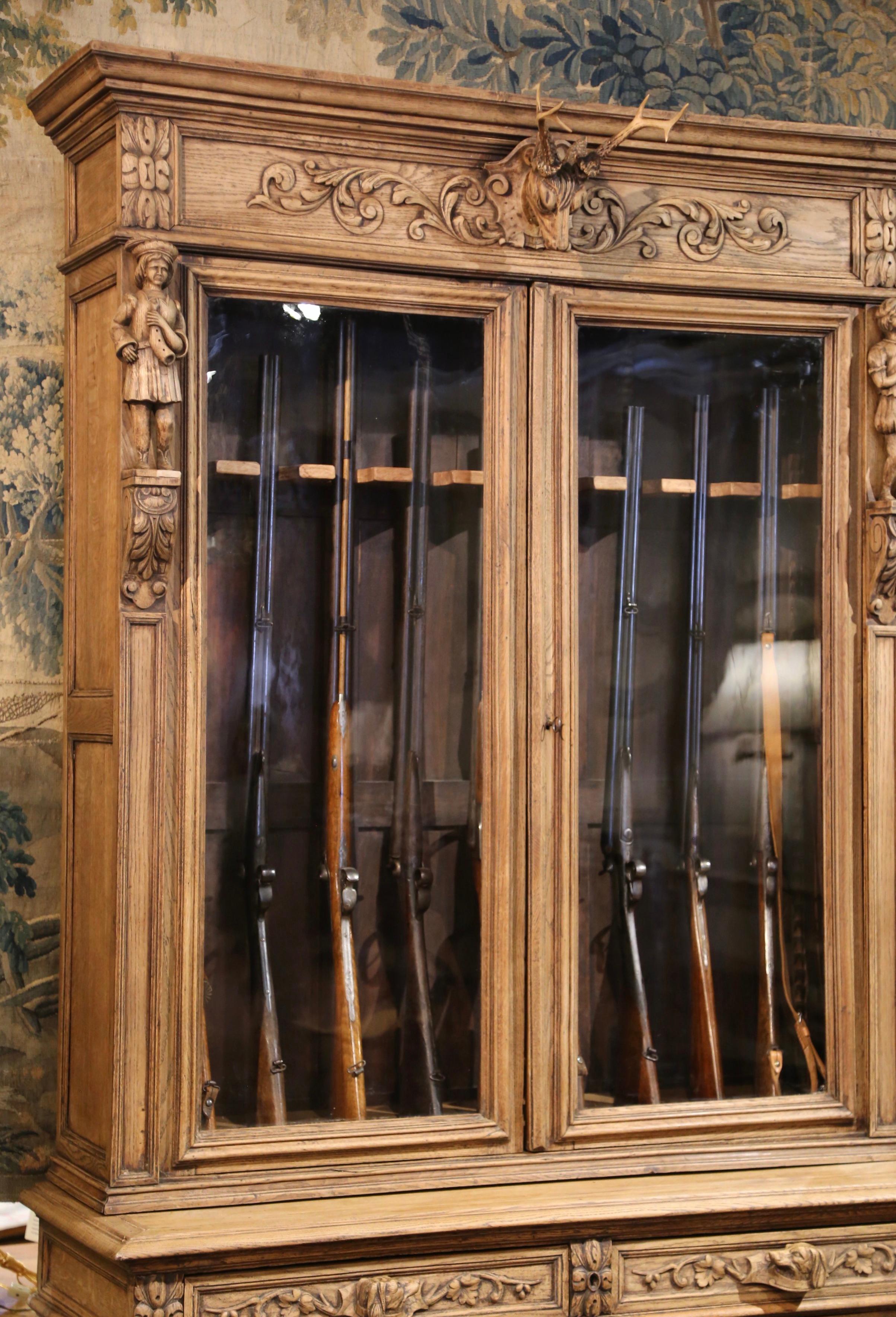 19th Century French Black Forest Carved Oak Nine-Gun Cabinet with Hunt Motifs 4