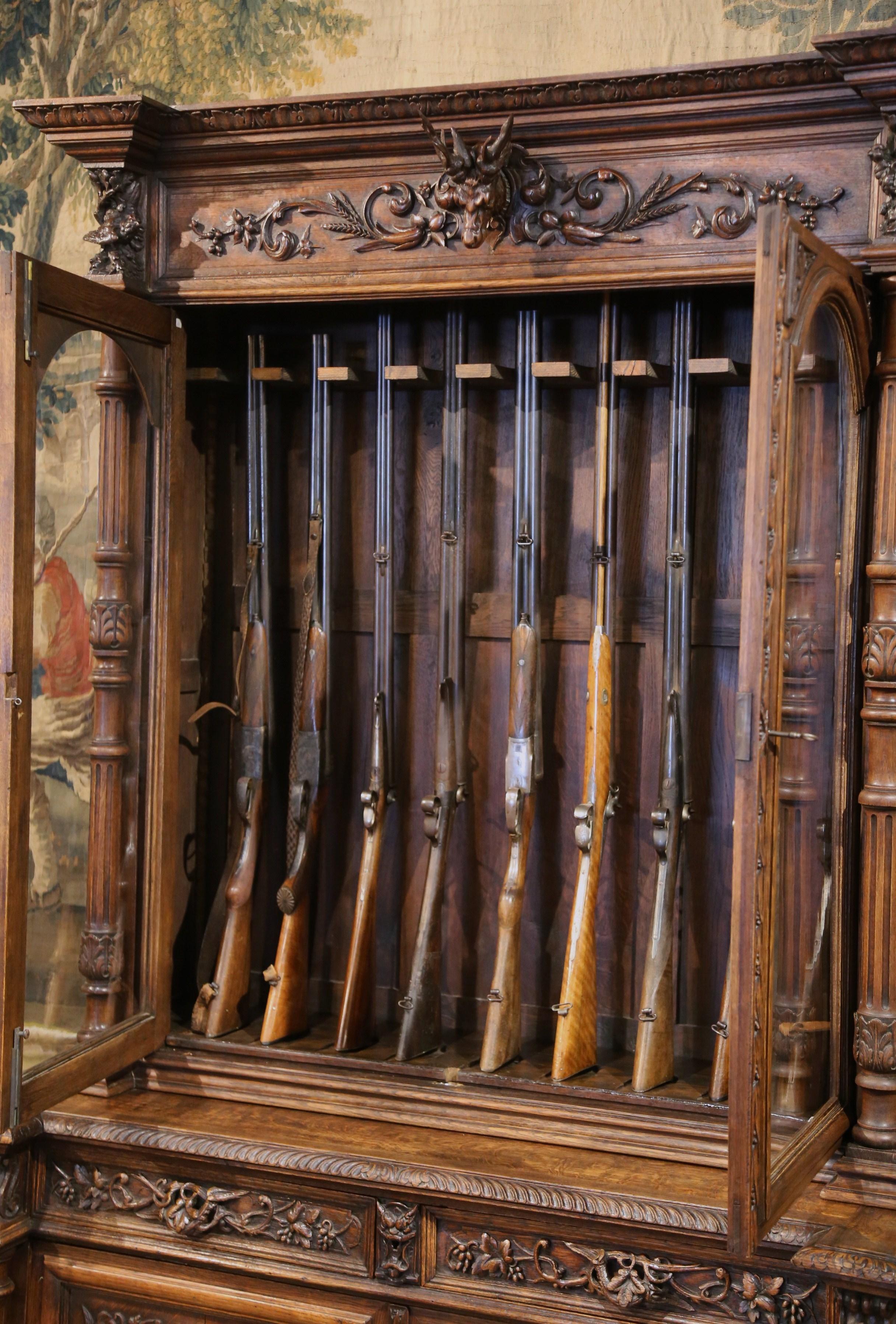 19th Century French Black Forest Carved Oak Nine-Gun Cabinet with Hunt Motifs 4