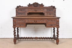 19th Century French Black Forest Carved Oak Writing Desk With Barley Twist Legs