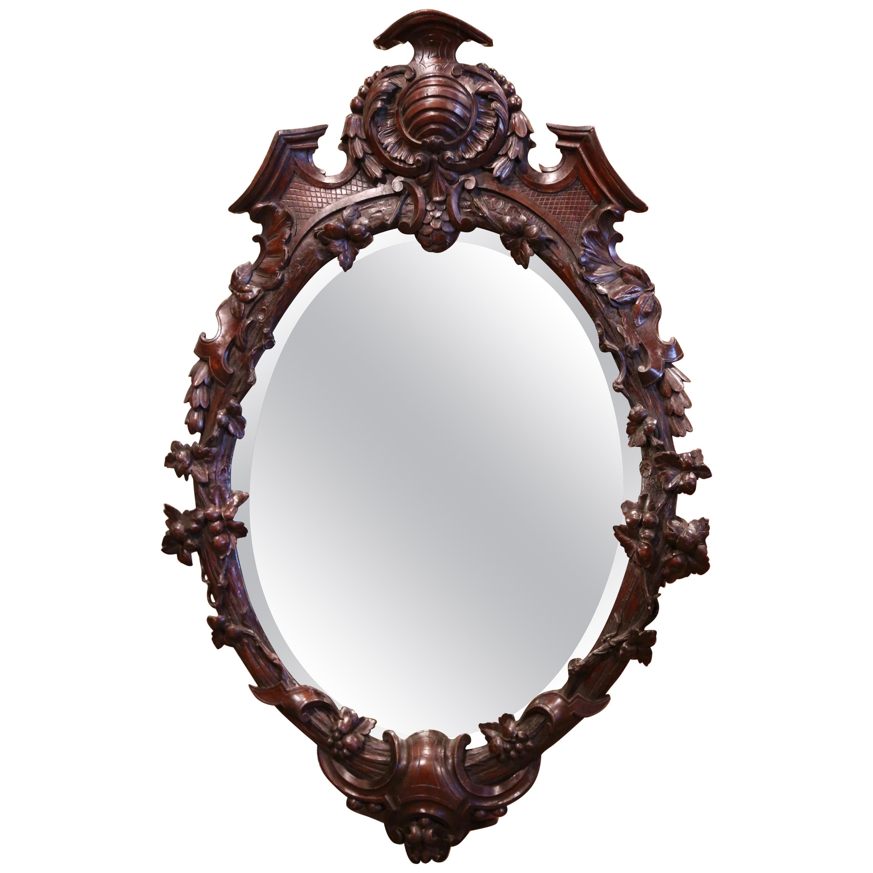 19th Century French Black Forest Carved Walnut and Beveled Glass Oval Mirror
