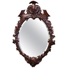 19th Century French Black Forest Carved Walnut and Beveled Glass Oval Mirror